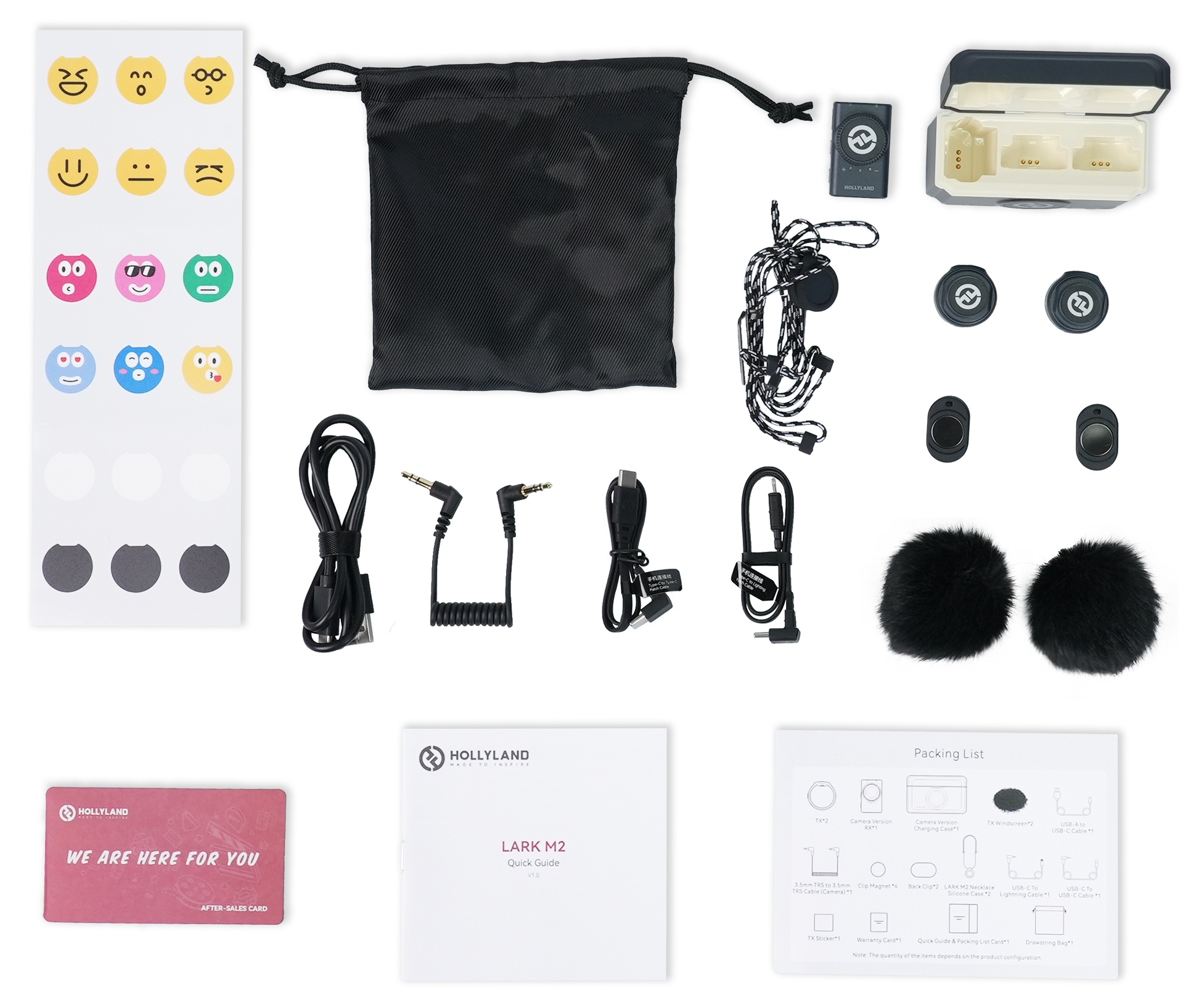 Widok z góry zestawu Hollyland Lark M2 z naklejkami, kablami, mikrofonami i etui ładującym.