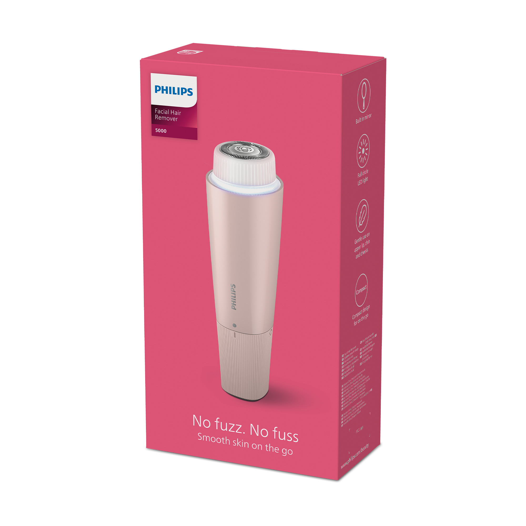 Una caja rosa Philips para depilación facial con el producto dentro. El texto incluye 'No fuzz. No fuss' y '5000'.