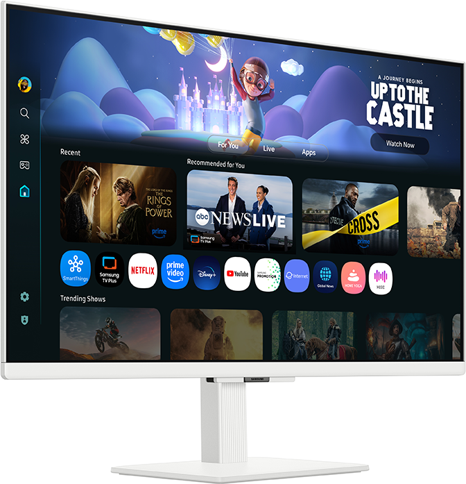Egy fehér Samsung monitor streaming szolgáltatás felületet jelenít meg. Egy rajzolt kastély és egy karakter a háttérben. Több alkalmazás ikon is látható.