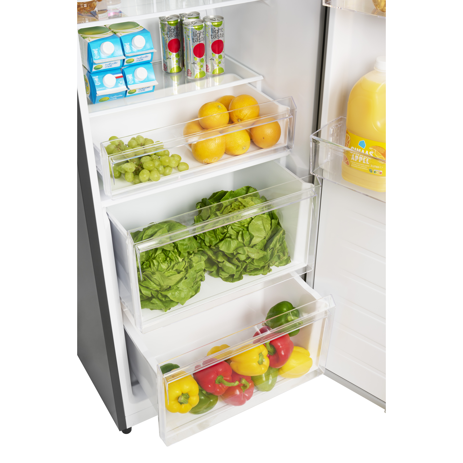 Open refrigerator filled with fruits, vegetables, drinks, and juice. Includes oranges, lettuce, peppers, grapes, milk, and canned drinks.