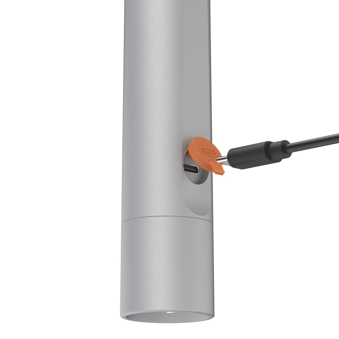 Ein silbernes zylindrisches Gerät mit einer orangefarbenen Abdeckung über einem Anschluss, verbunden mit einem schwarzen Kabel auf weißem Hintergrund.