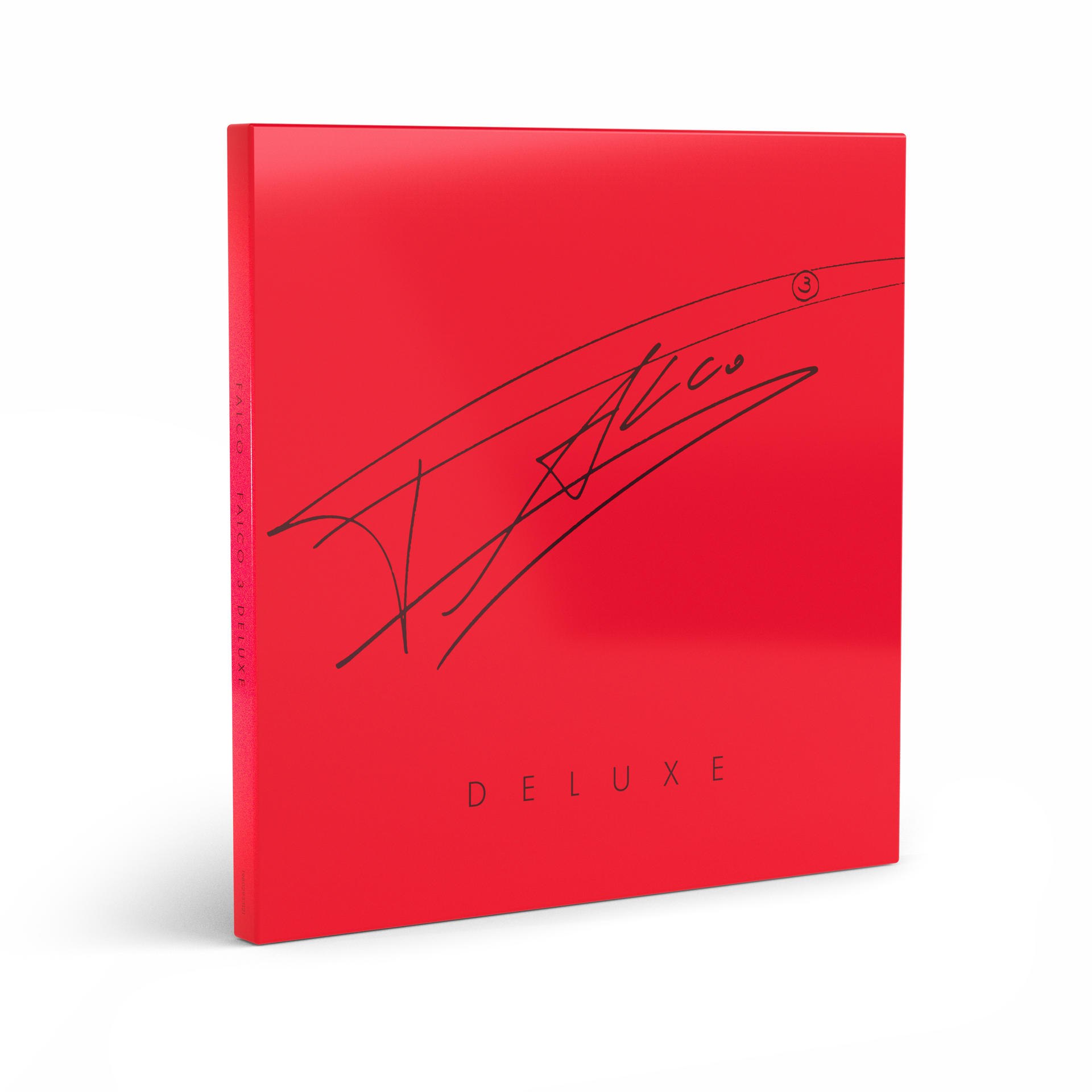 Rotes Albumcover mit schwarzer Unterschrift und dem Wort 'DELUXE'. Der Buchrücken sagt 'FALCO 3 DELUXE'.