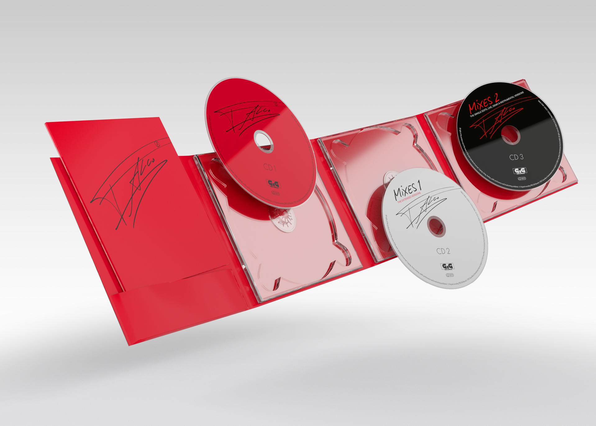 Eine rote CD-Hülle geöffnet, mit drei CDs. Die CDs sind mit CD1, CD2 und CD3 beschriftet, mit Cover-Art und Text.