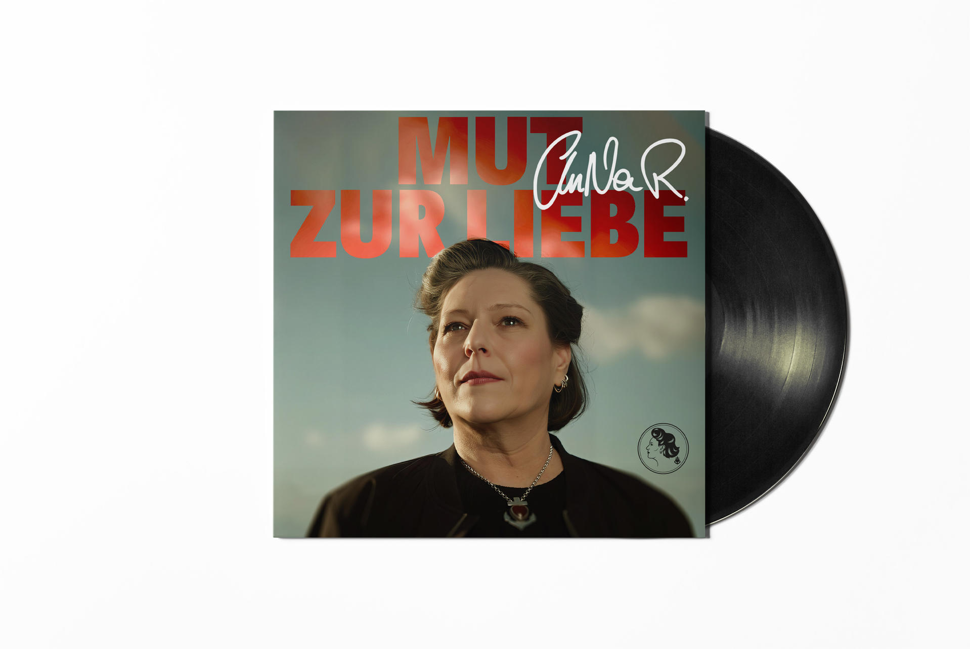 Albumcover zeigt eine Frau, die nach oben schaut. Roter und weißer Text lautet 'MUT ZUR LIEBE'. Eine Schallplatte ist rechts.