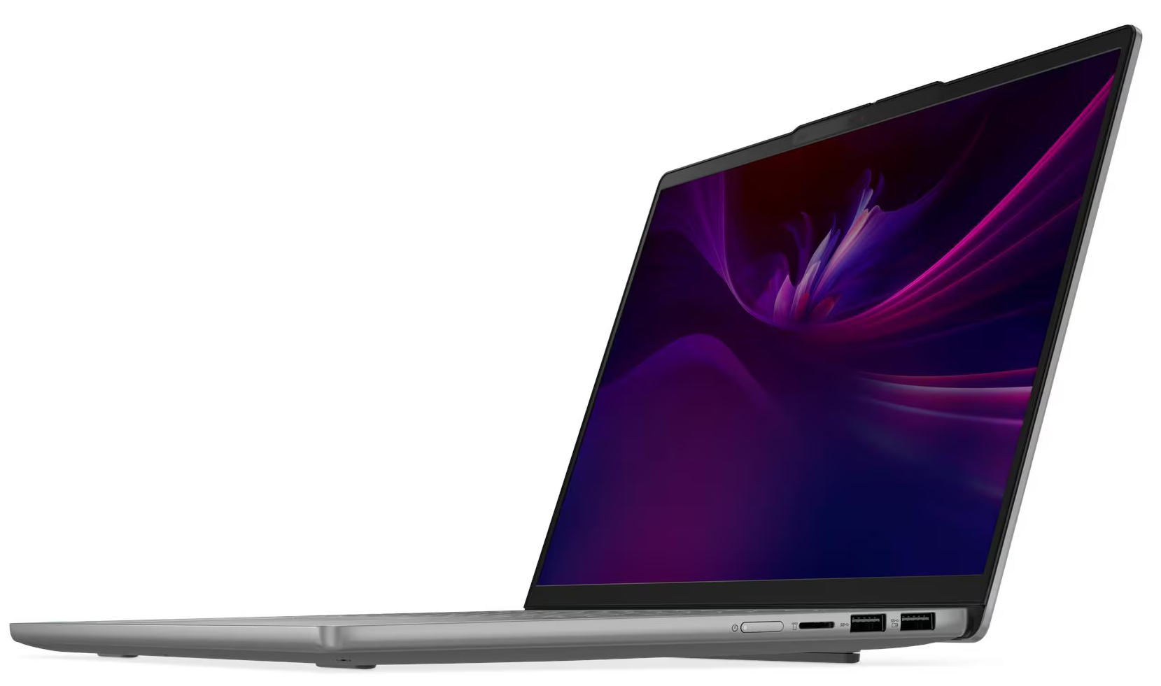 Ezüst laptop fehér háttérrel. A képernyő lila és rózsaszín absztrakt dizájnt mutat, enyhén nyitva.