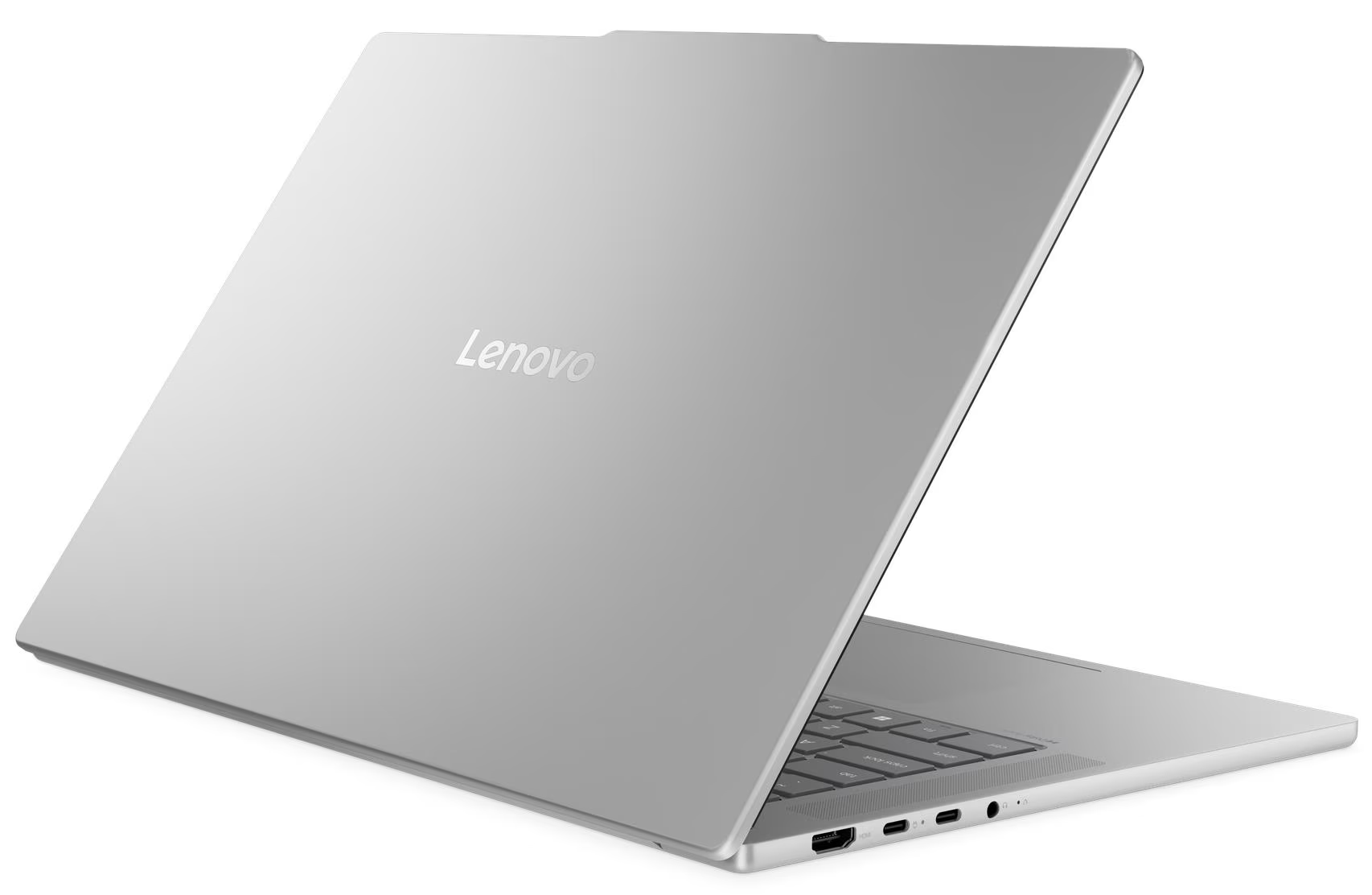 Ezüst Lenovo laptop, szögben nyitva. Billentyűzet látható. Lenovo logó a fedélen. Fehér háttér.