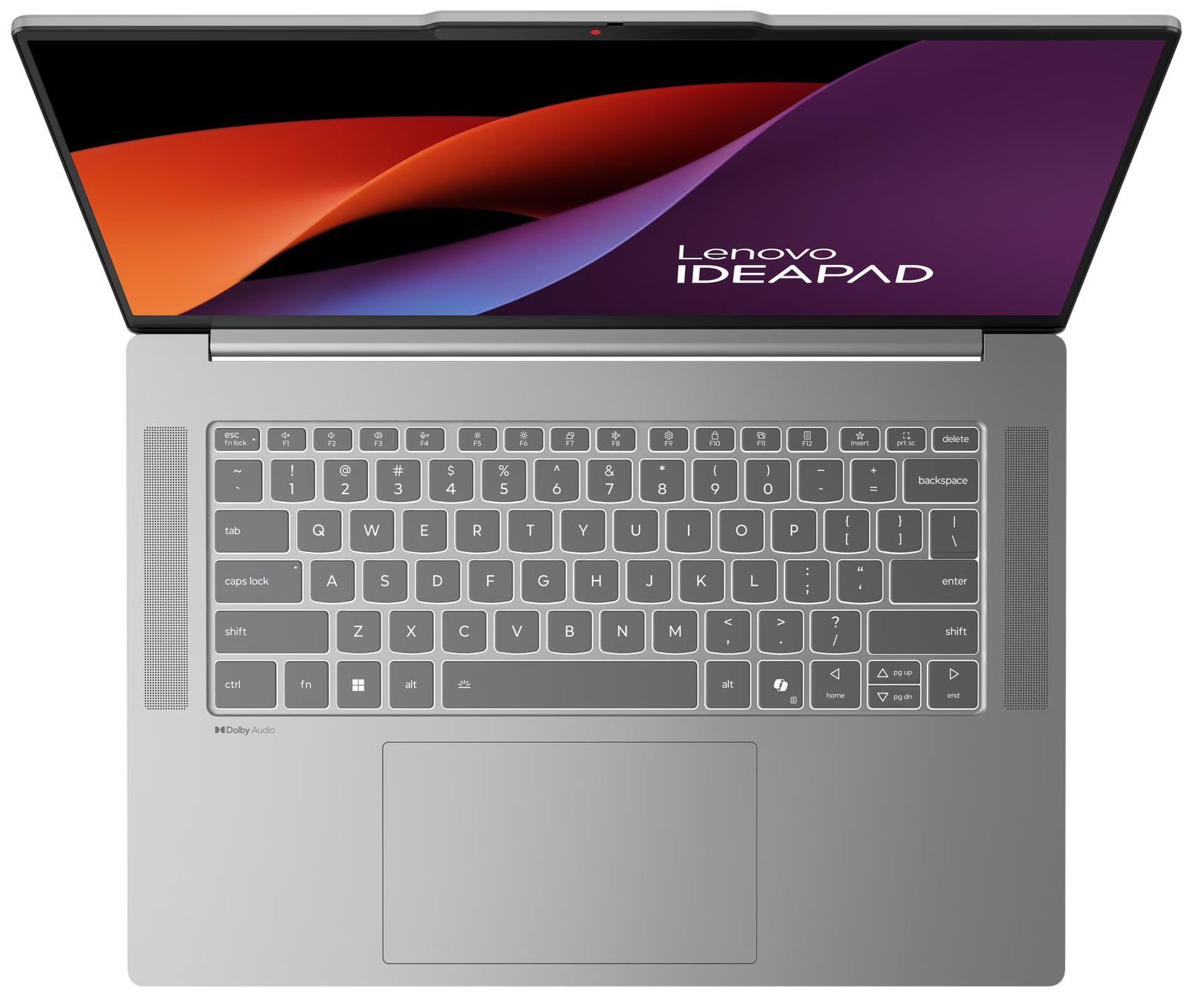 Egy ezüst Lenovo IdeaPad laptop nyitva. A képernyő színes absztrakt képet mutat. A billentyűzet látható.