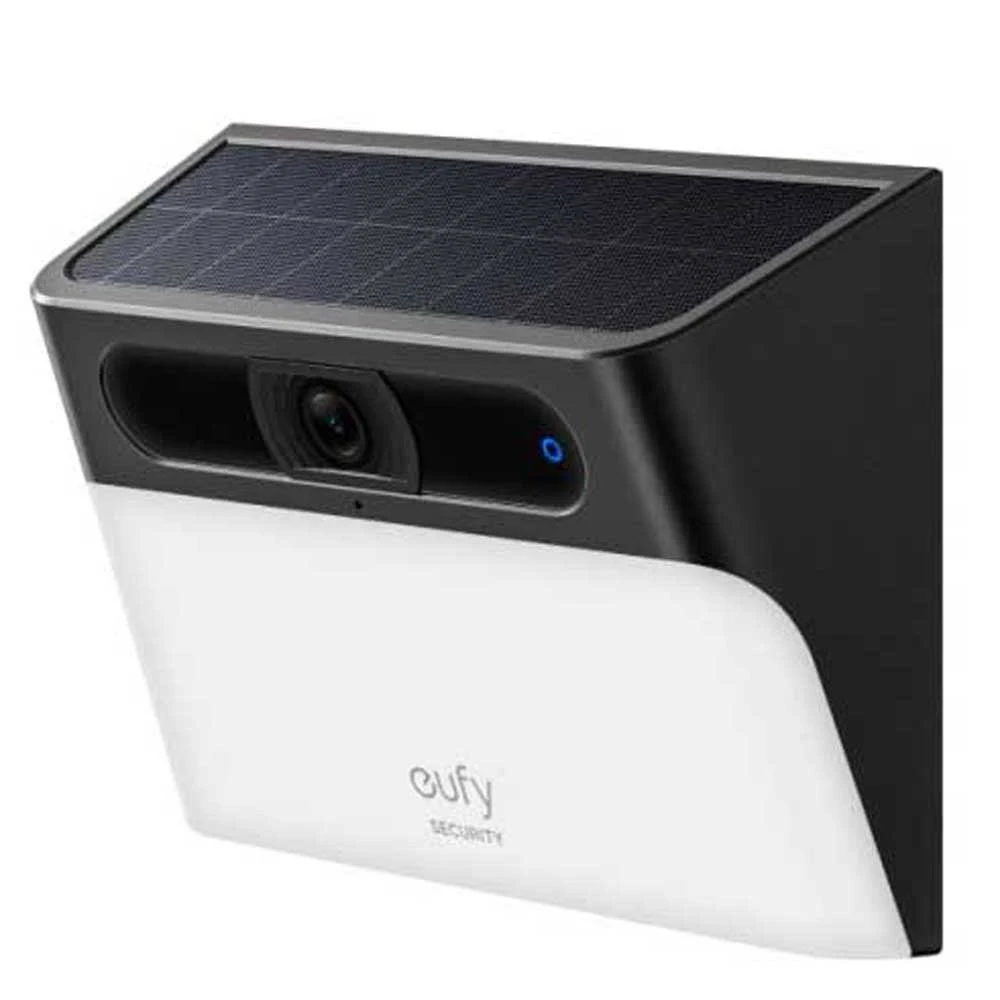 Cámara de seguridad blanca y negra con panel solar. Visible la marca 'eufy'.