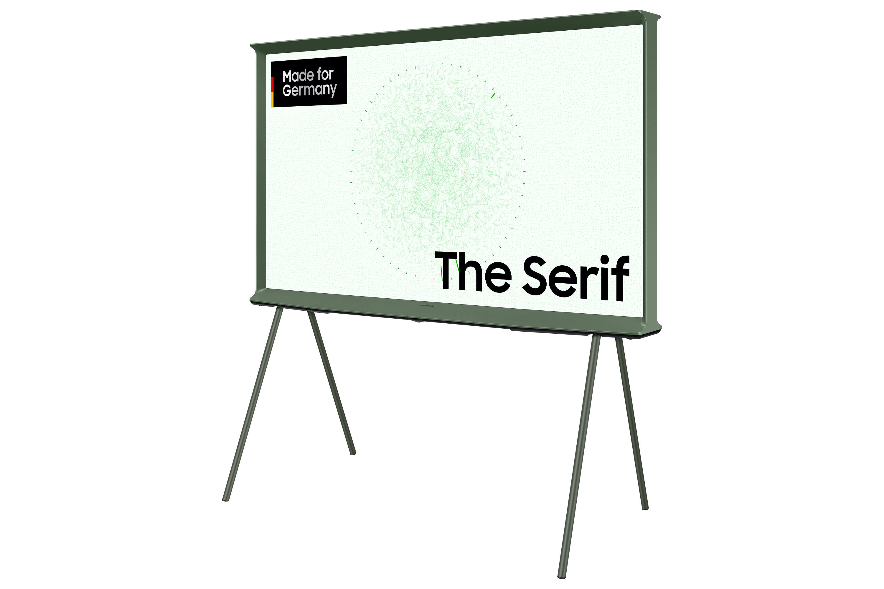 Ein grüner Fernseher auf einem Ständer. Er hat einen weißen Bildschirm mit grünem Muster und Text 'The Serif'.