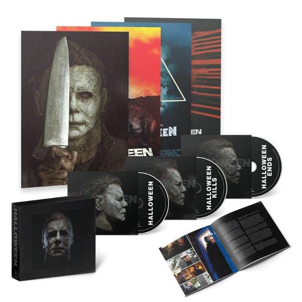 Halloween-Filmset. Enthält DVDs, eine Box und Broschüren. Die Box-Art zeigt Michael Myers. Verschiedene Farben mit weißem Hintergrund.