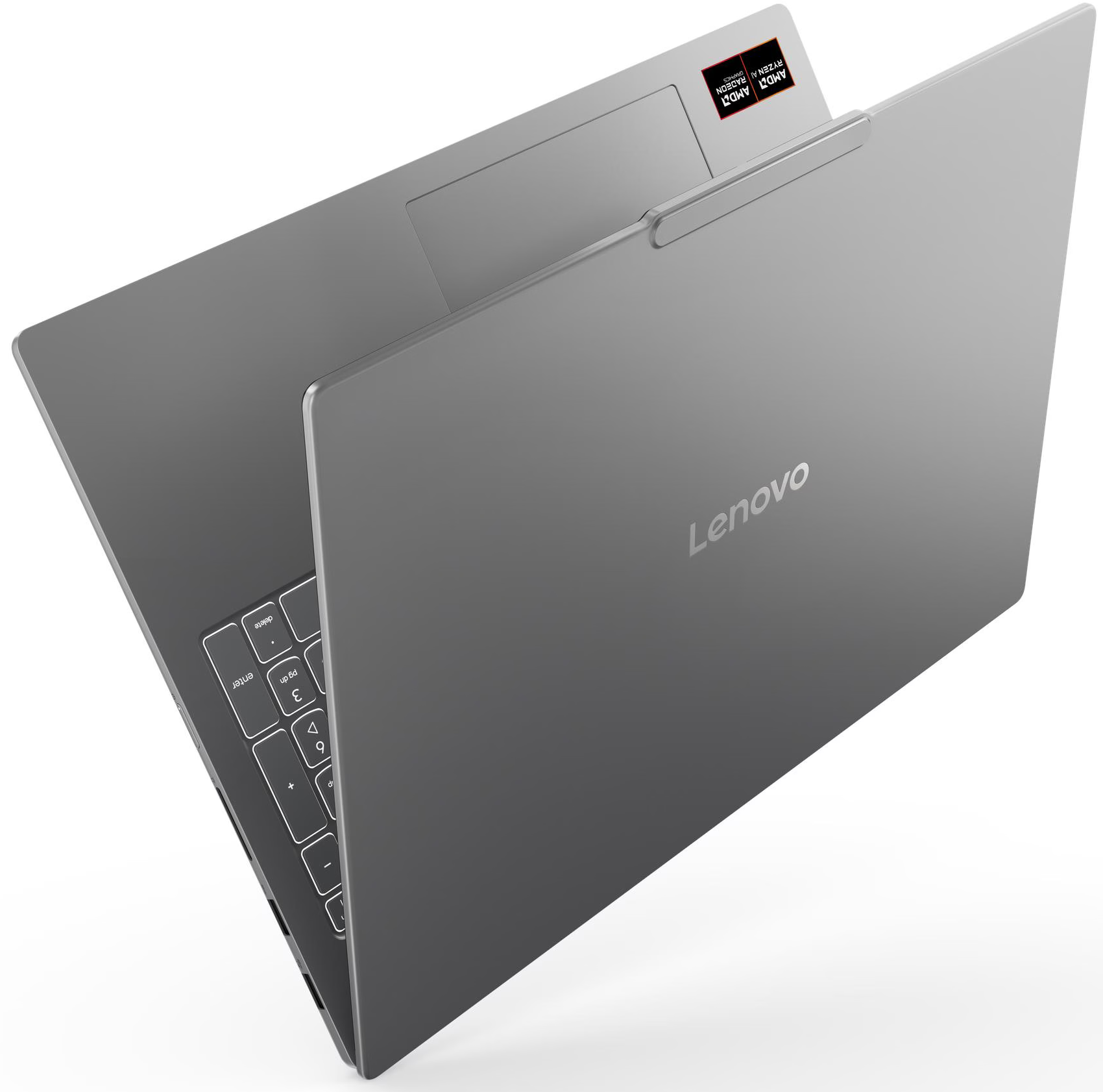 Egy szürke Lenovo laptop nyitva, a billentyűzetet és a képernyőt mutatja. Az AMD Ryzen AI matrica látható.