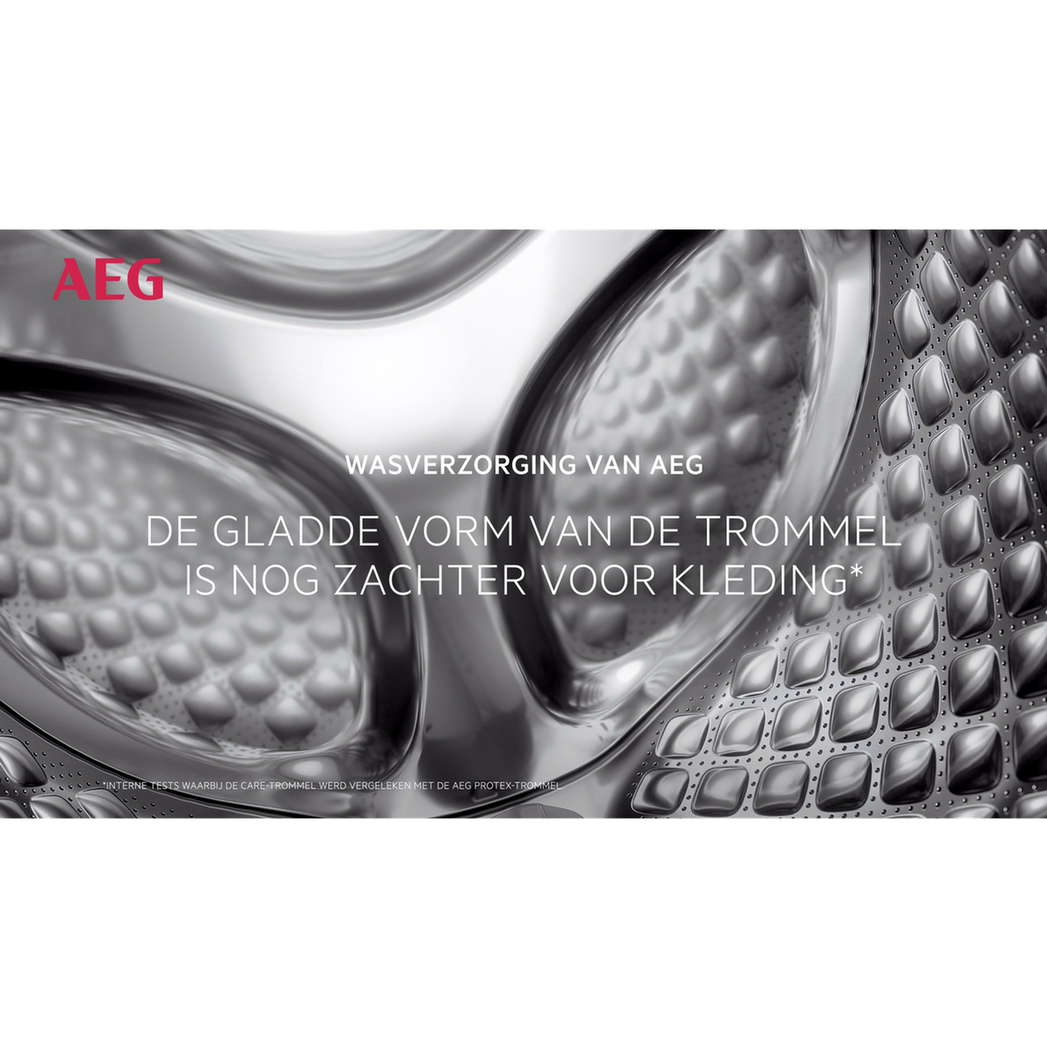 Close-up of a washing machine drum with the AEG logo. Text says "softer for clothes". The drum has a smooth, metallic surface.
