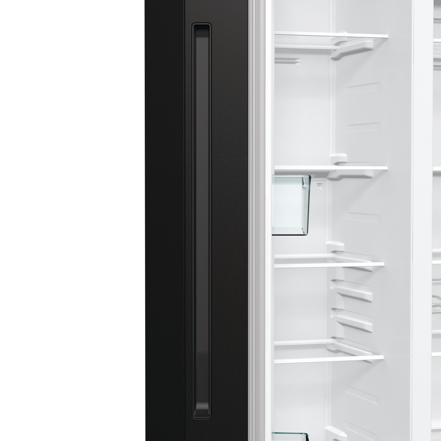 A black refrigerator door with a handle is on the left. The fridge is open. White shelves and a glass container are inside.