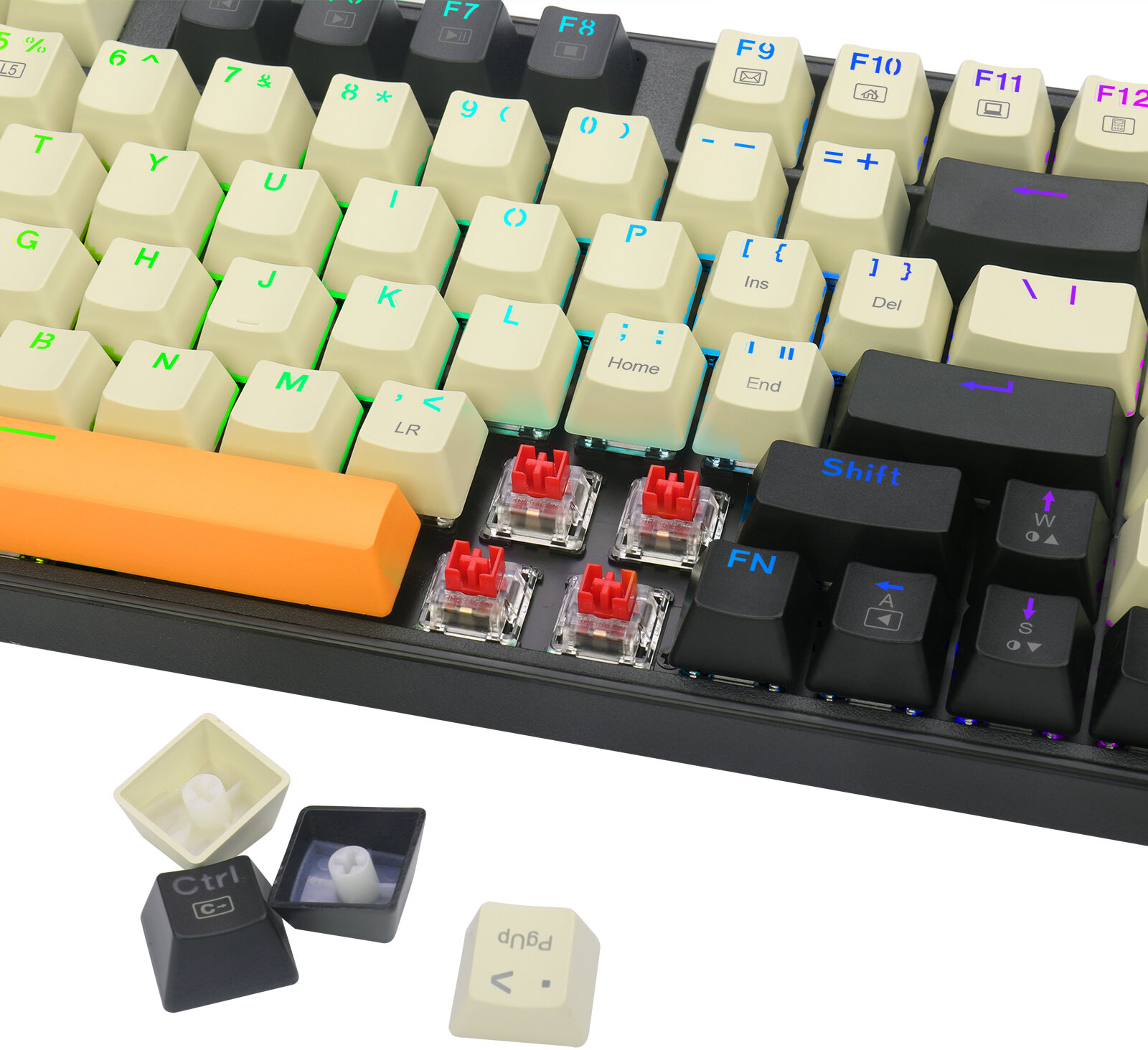 Klawiatura mechaniczna z kremowymi klawiszami, czarną ramką. Usunięto niektóre klawisze, widoczne czerwone przełączniki.