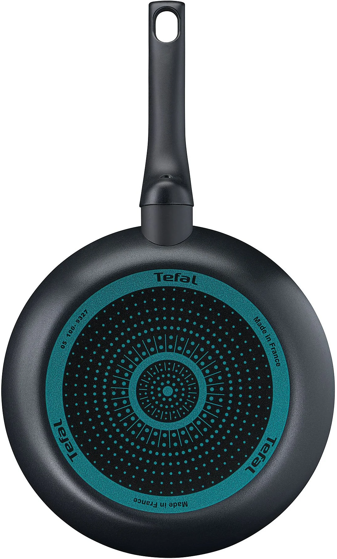 Schwarze Tefal-Bratpfanne, Unterseite sichtbar. Türkis Akzente mit Punktmuster. Griff mit Aufhängeloch. Hergestellt in Frankreich.