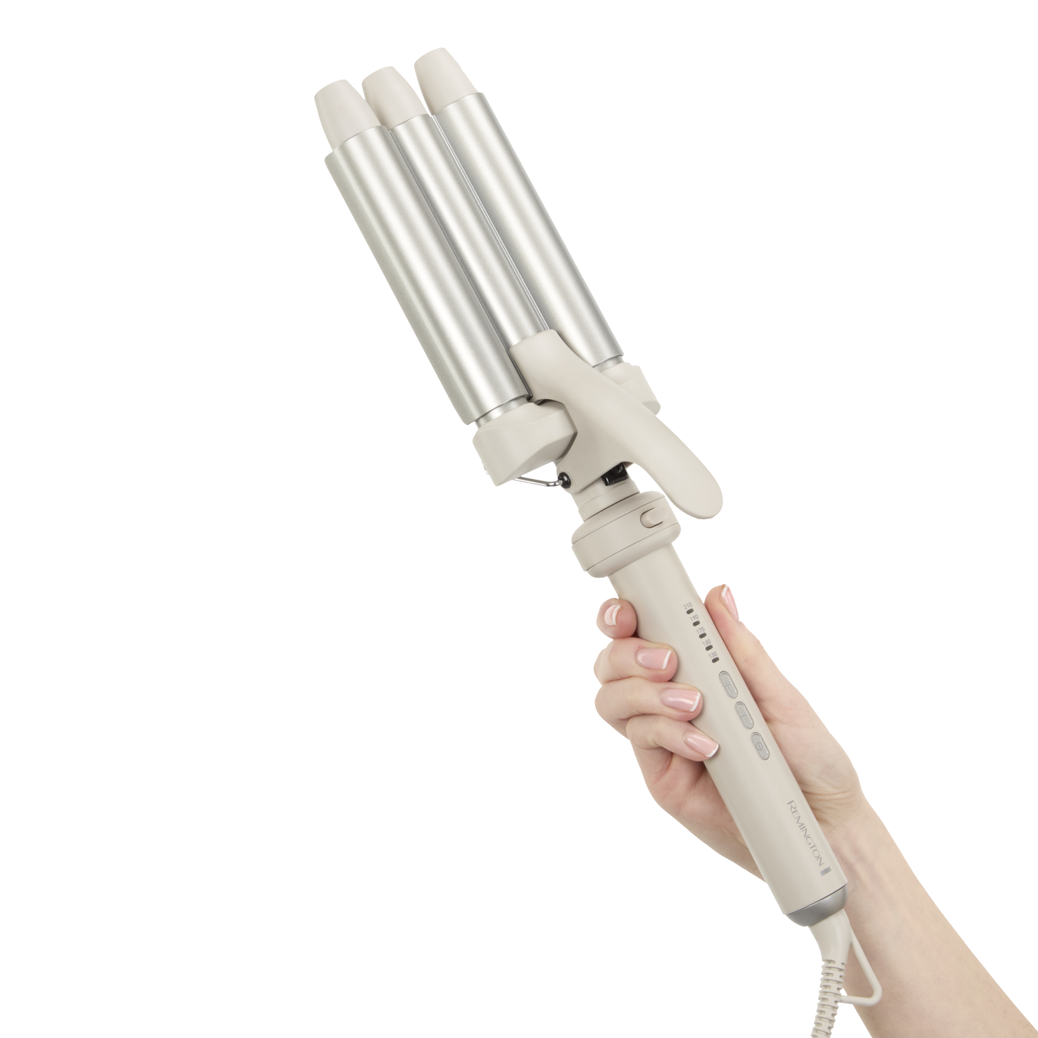 A woman's hand holds a silver and beige Remington hair waver on a white background. The waver is angled upwards.