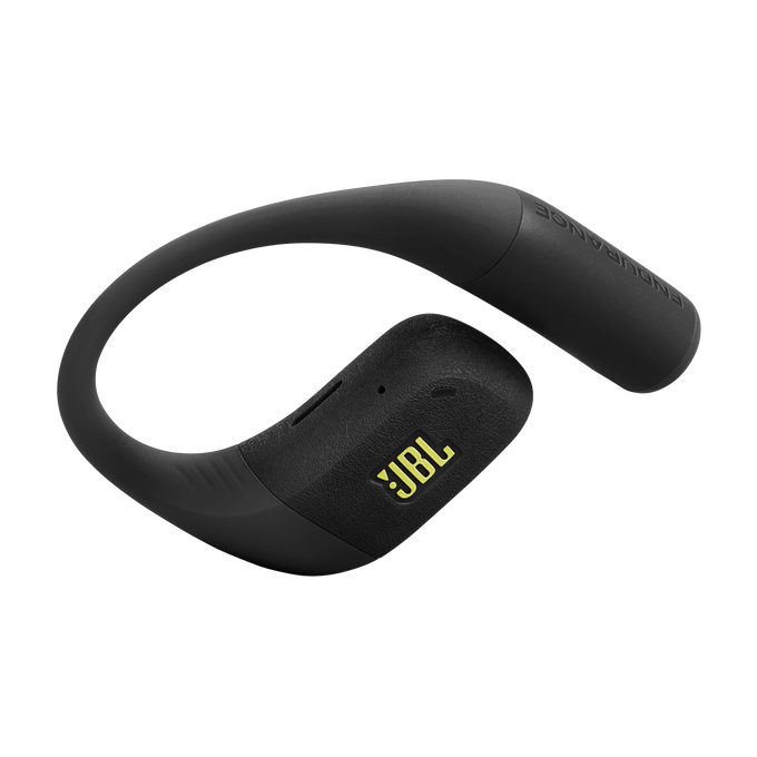 Auriculares inalámbricos JBL Endurance negros, con el logotipo amarillo de JBL. El auricular se envuelve alrededor de la oreja. Fondo negro.