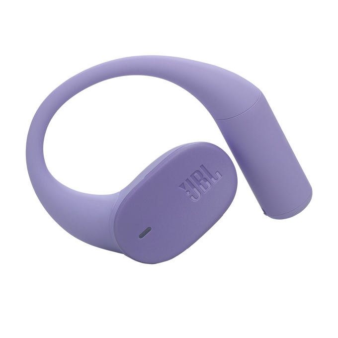Un auricular JBL lavanda, diseño curvo con gancho. El logotipo de JBL es visible. El fondo es negro.