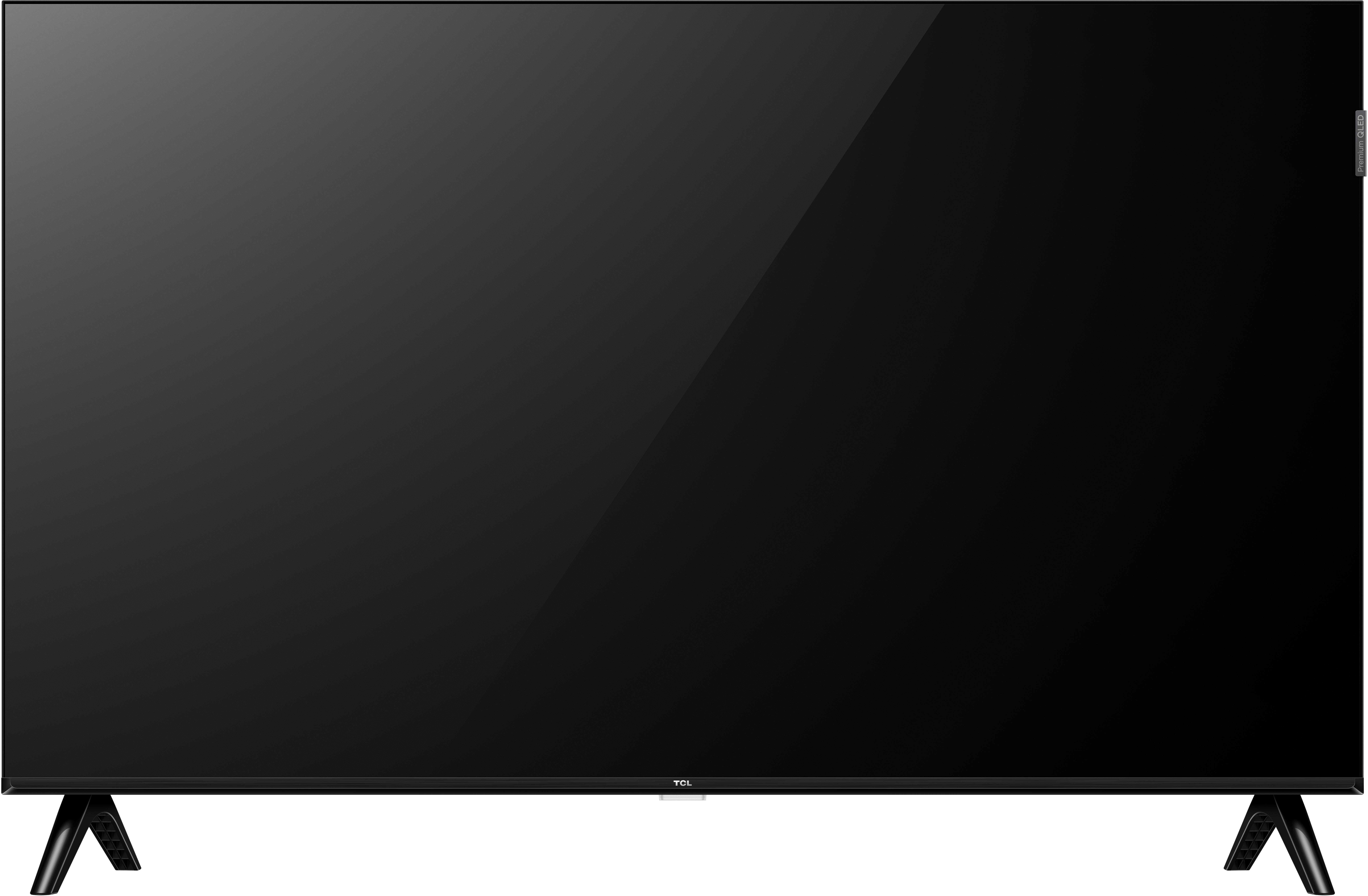 Un grand téléviseur TCL noir est présenté. Il a un écran brillant, avec des pieds noirs. La télévision est sur fond blanc.