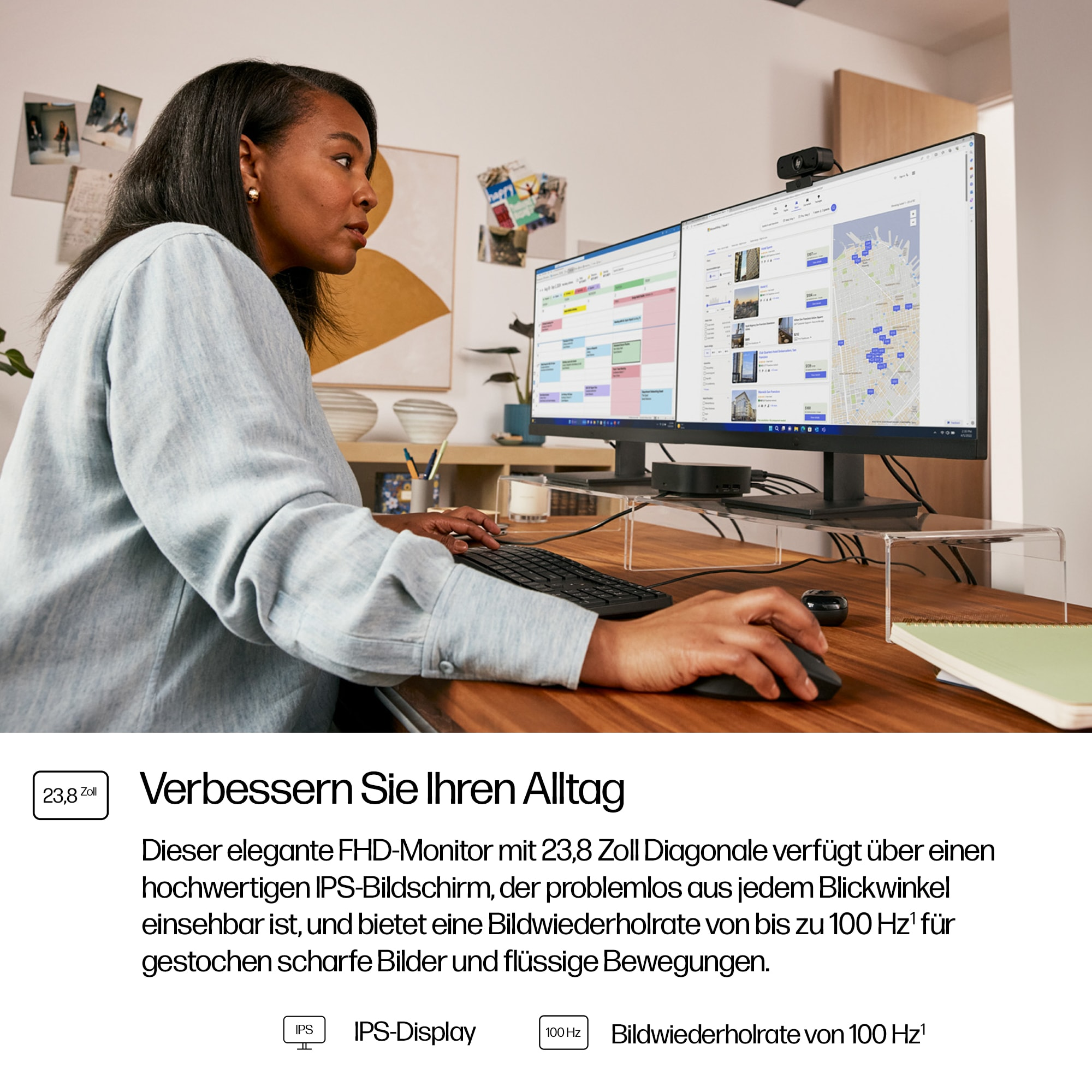 Frau benutzt Dual-Monitor mit Webcam. Zeigt Kalender und Karte. Sie benutzt Tastatur und Maus.