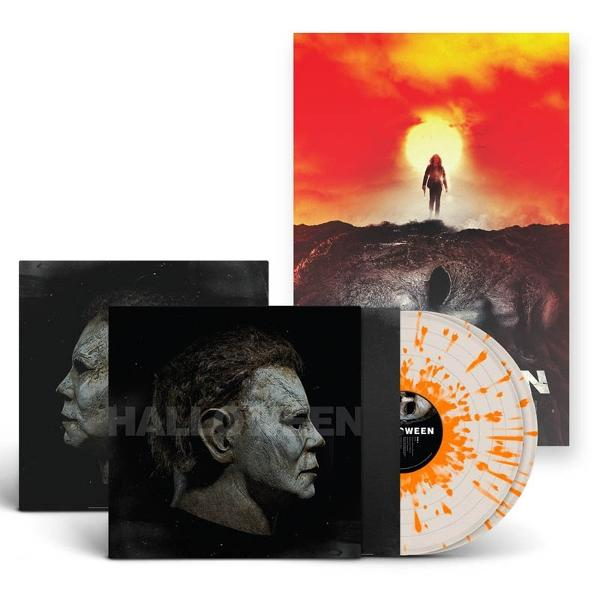 Halloween-Vinyl-Schallplattenset. Enthält ein Poster mit einer Figur, die auf die Sonne zugeht. Die Schallplatte hat orange und weiße Flecken.