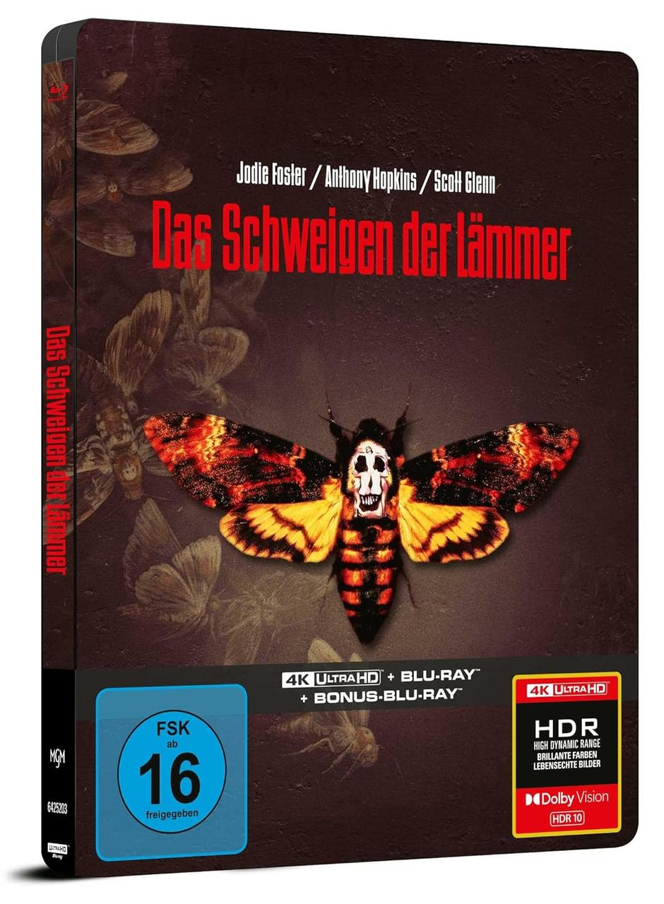 Filmcover für 'Das Schweigen der Lämmer'. Zeigt eine Motte mit einem Totenkopf auf dem Rücken. Text und Logos sind ebenfalls vorhanden.