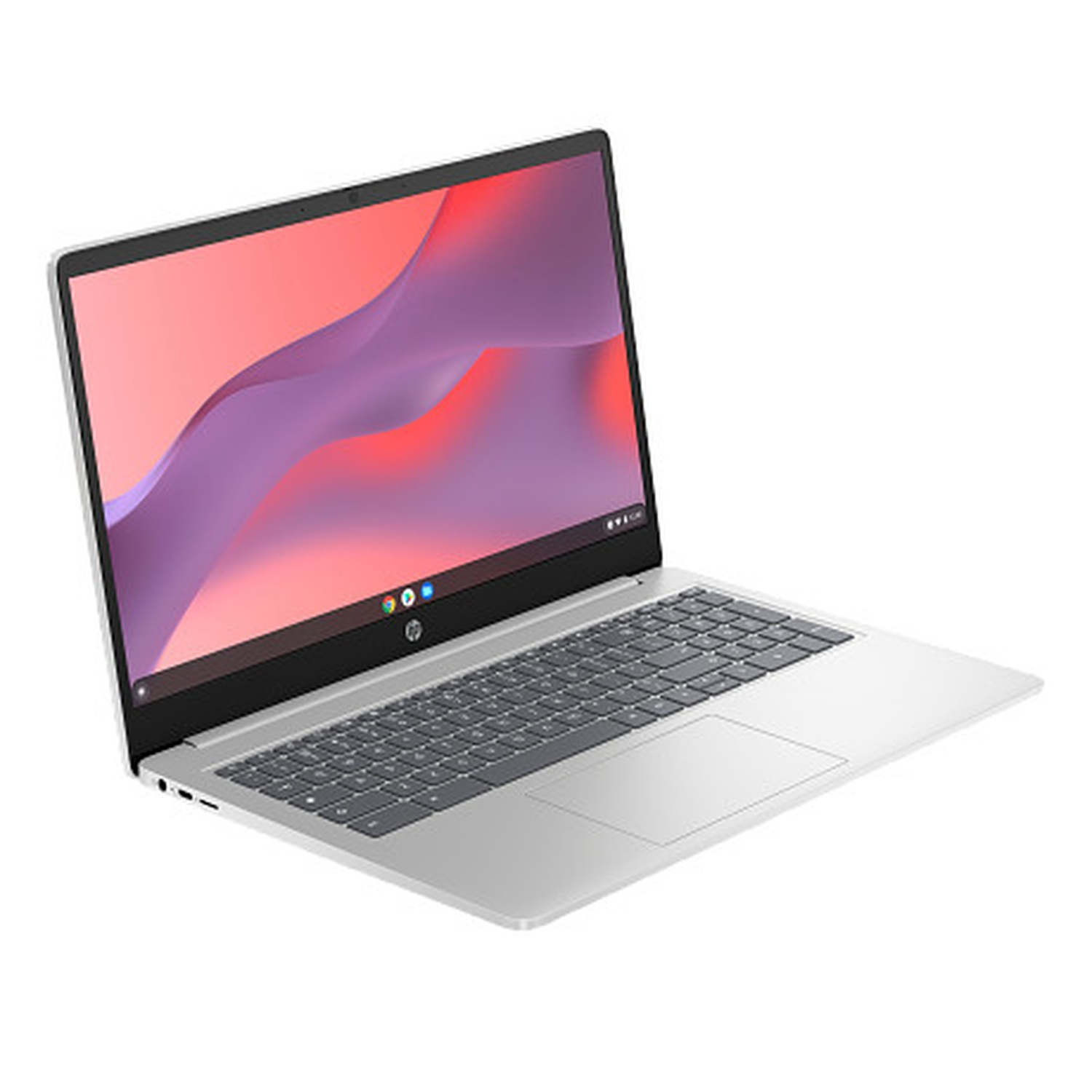 A silver HP laptop is open, displaying a pink and purple abstract image on the screen. The keyboard and touchpad are visible.