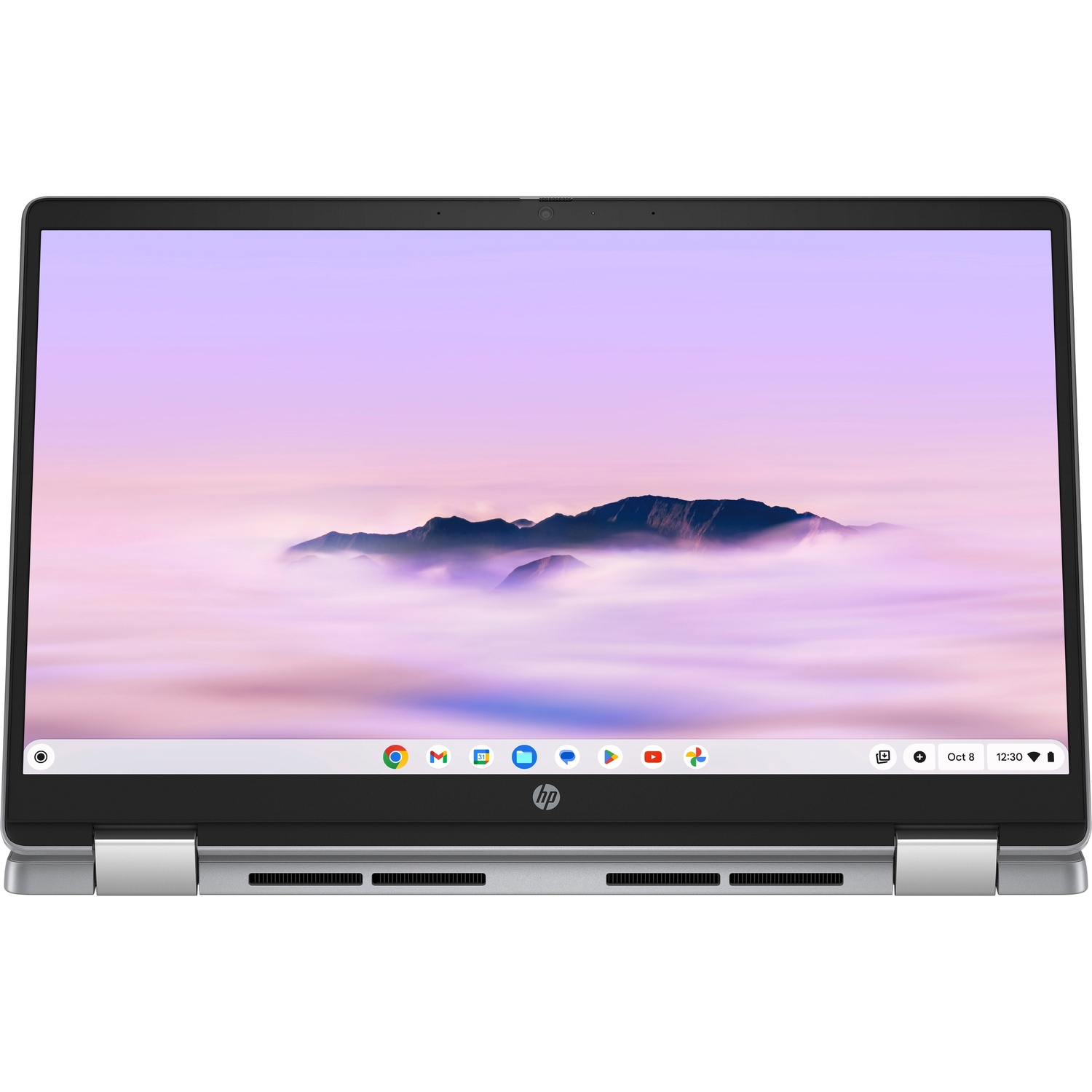 An HP Chromebook laptop is open. The screen shows a mountain range with a purple and white cloudy sky. The laptop is silver.