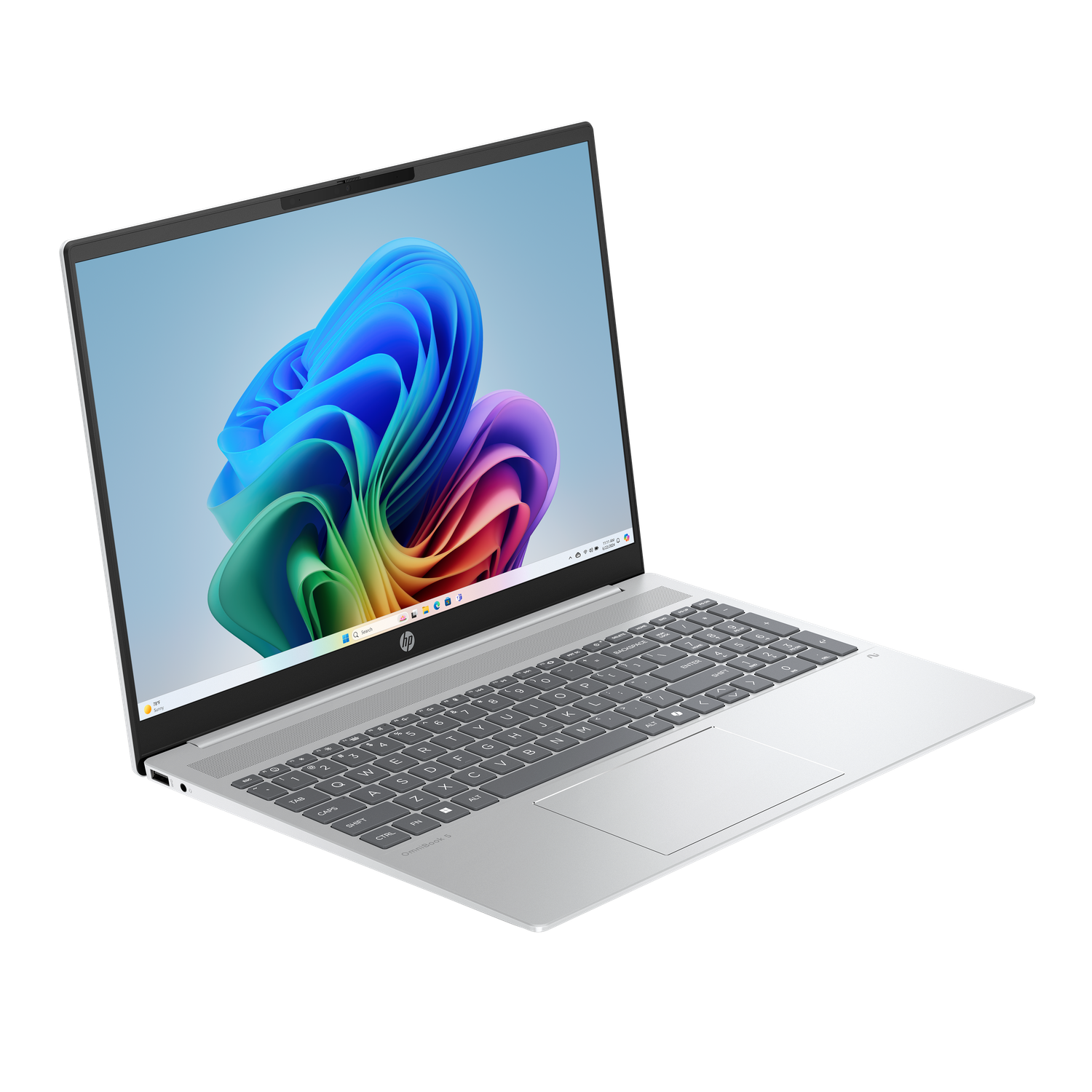 A silver HP laptop is open, displaying a colorful, abstract image on the screen. The keyboard is visible, and the background is black.