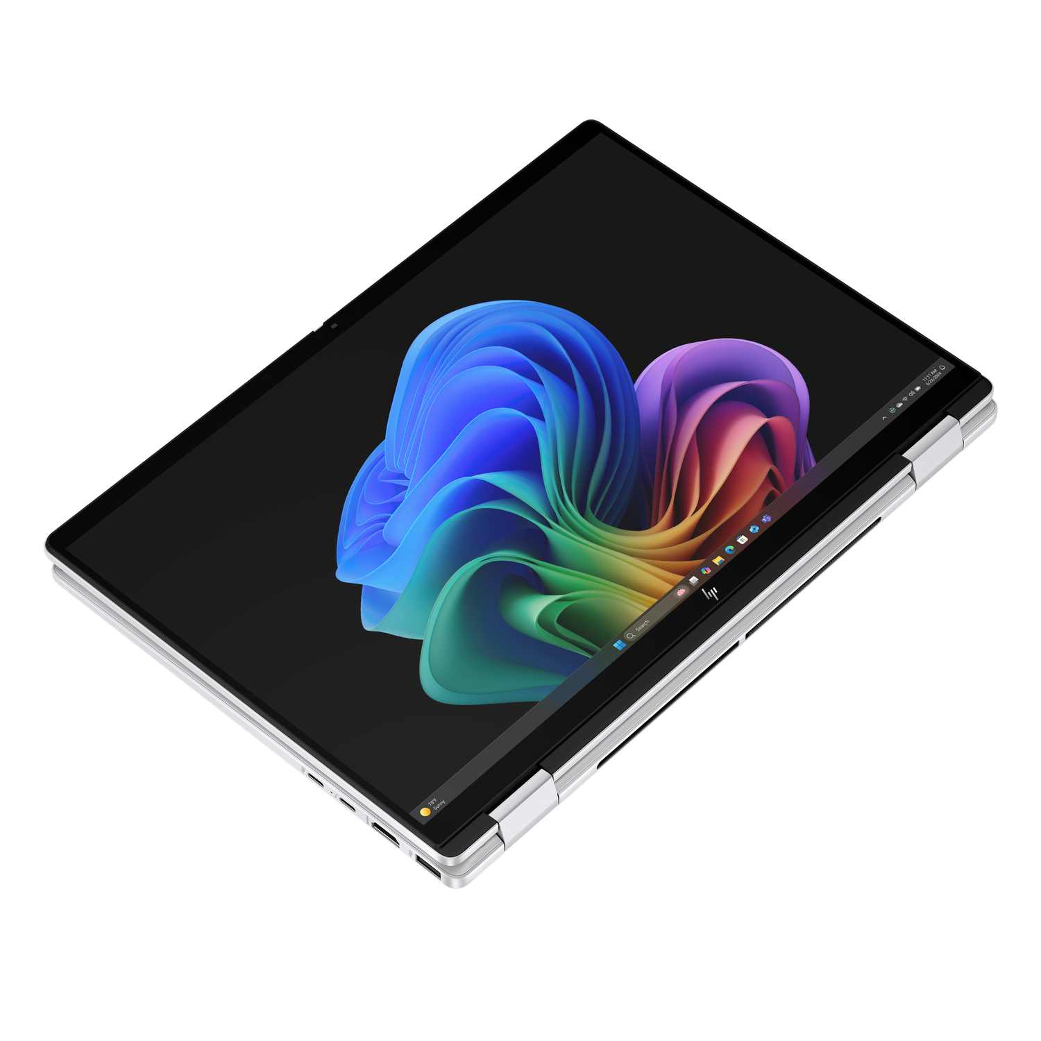 Laptop with a colorful abstract background. The screen displays a Windows interface. The laptop is silver with a black frame.