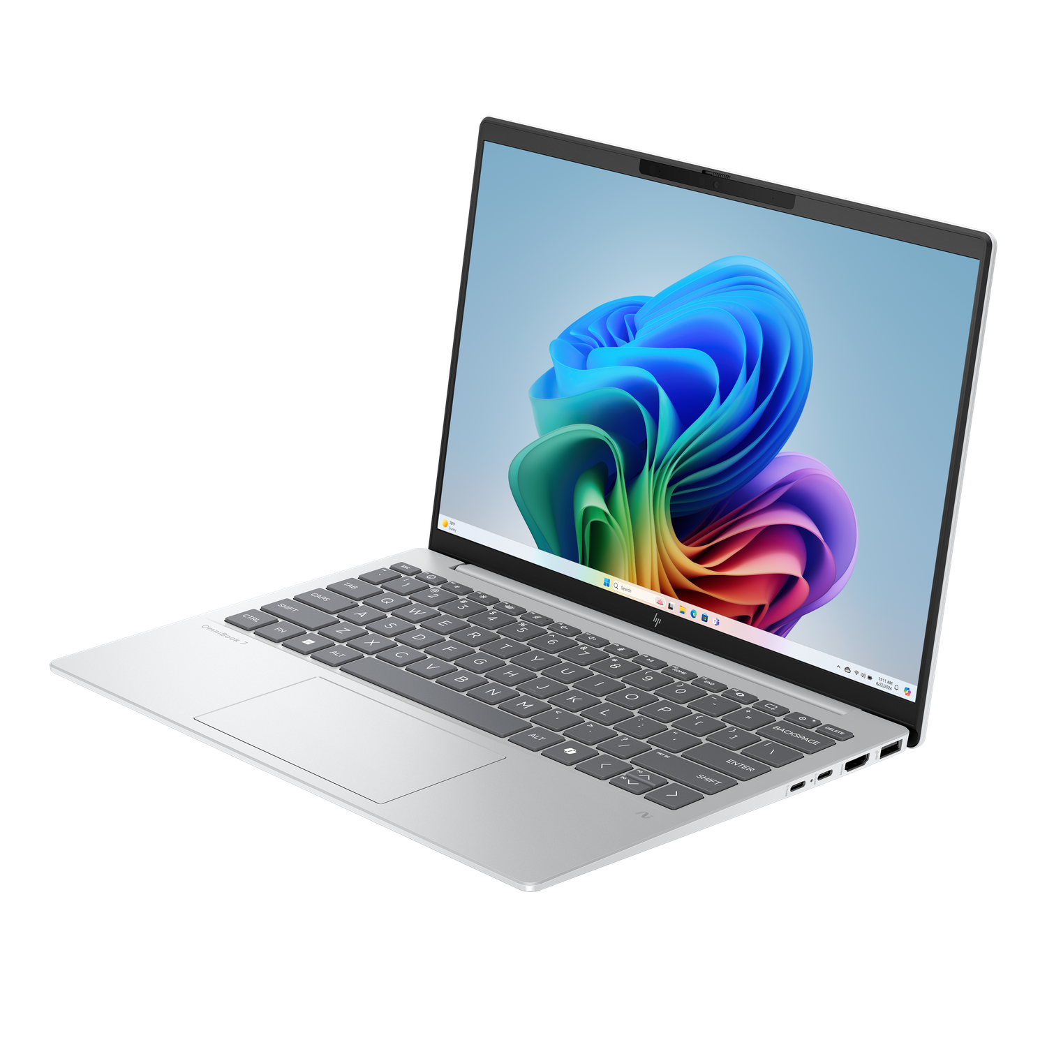 A silver laptop is displayed at an angle, showing the keyboard and screen. The screen displays a colorful abstract image against a black background.