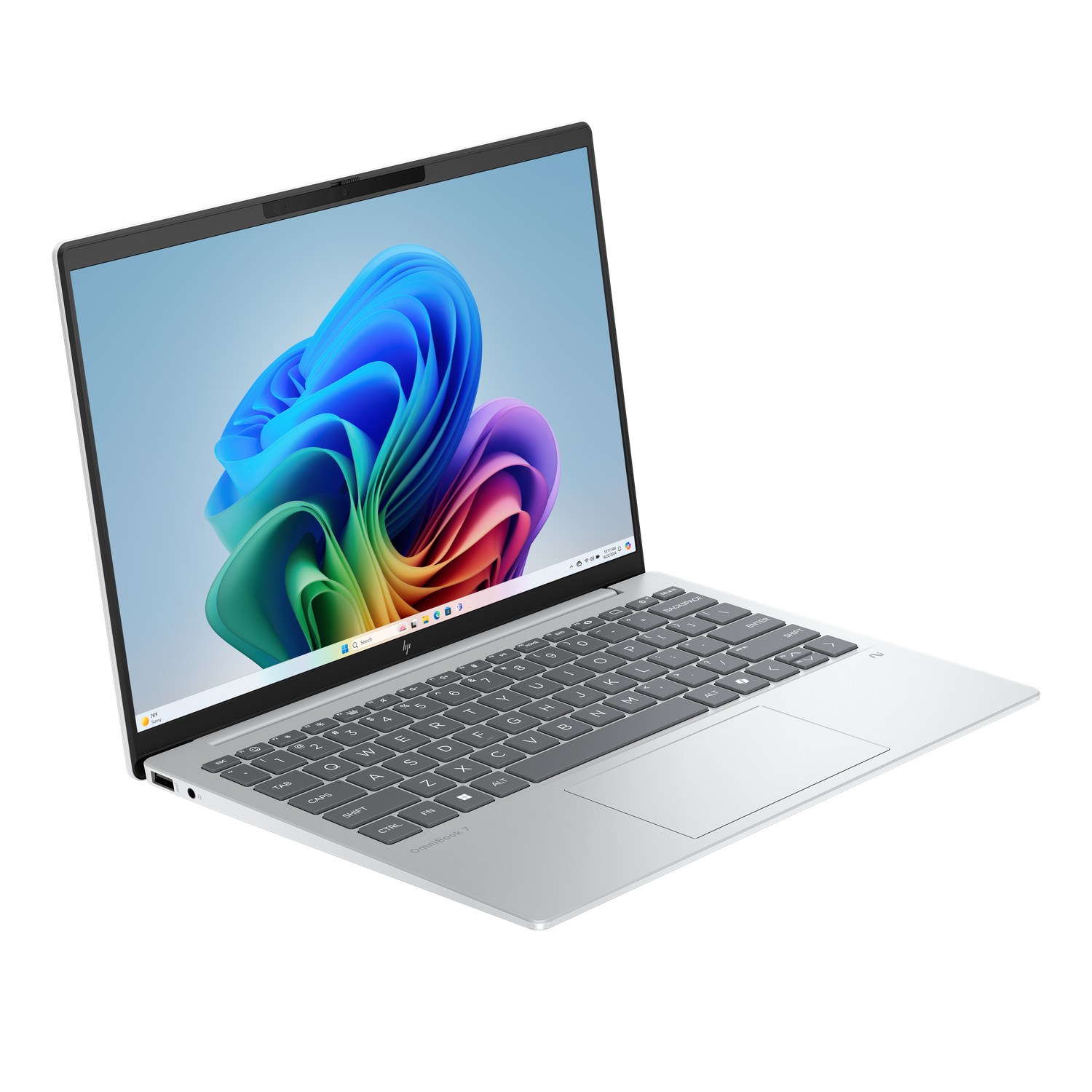 A silver HP laptop is displayed. The screen shows colorful abstract art. The keyboard is visible. The background is black.
