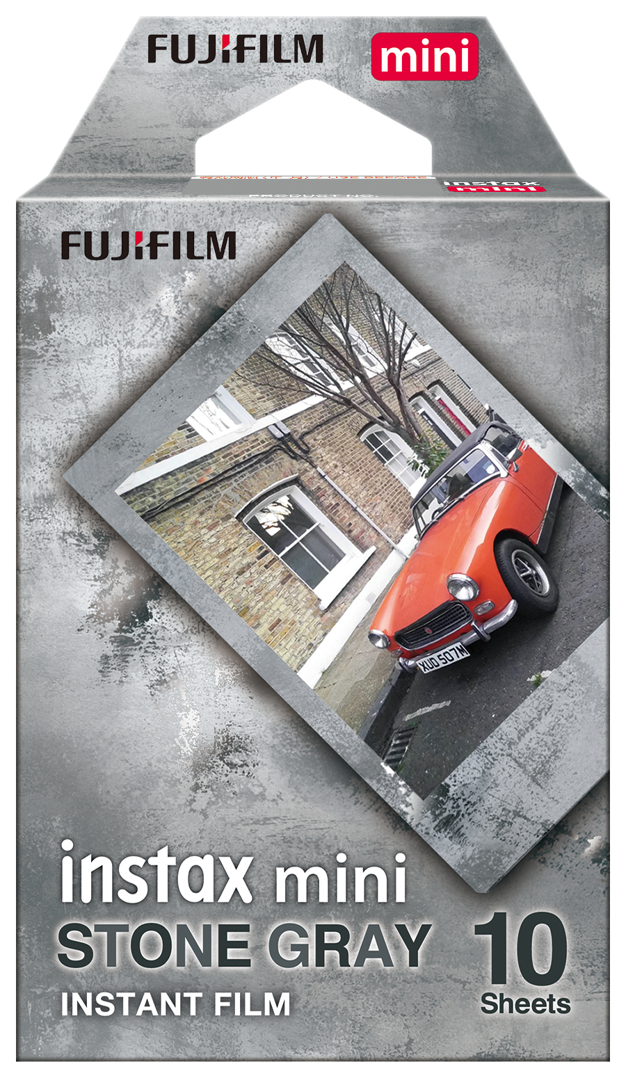 Pudełko z filmem Fujifilm Instax Mini Stone Gray. Zawiera zdjęcie pomarańczowego samochodu na ulicy miasta.