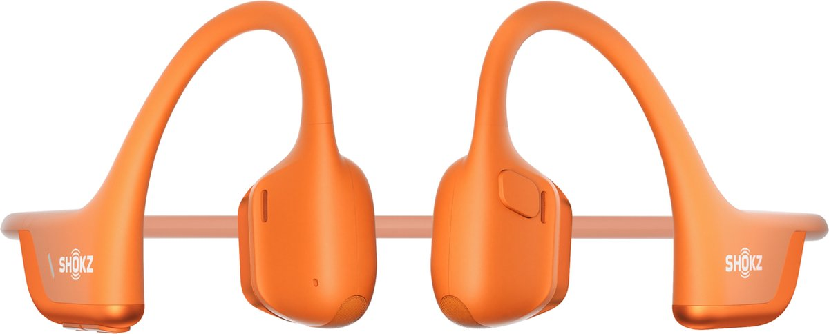 Turuncu Shokz kemik iletimli kulaklık. Tasarım, başın üzerinden bir yay ve kulaklık parçaları içerir.