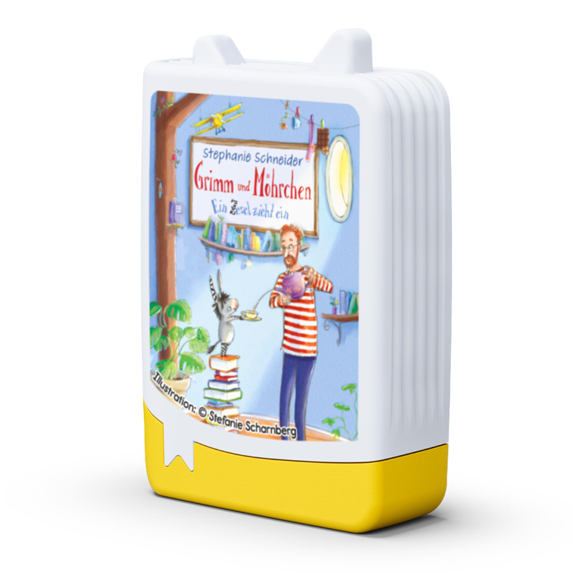 Ein buchförmiges Gerät mit einer Cartoon-Illustration eines Mannes, der einem Esel Tee einschenkt. Titel: Grimm und Möhrchen. Gelb und weiß.