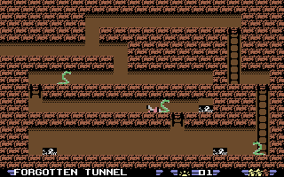 Verpixelte Spielszene: ein Tunnel mit Schlangen und Totenköpfen. Eine Figur bewegt sich durch das Labyrinth, mit Leitern zum Klettern.