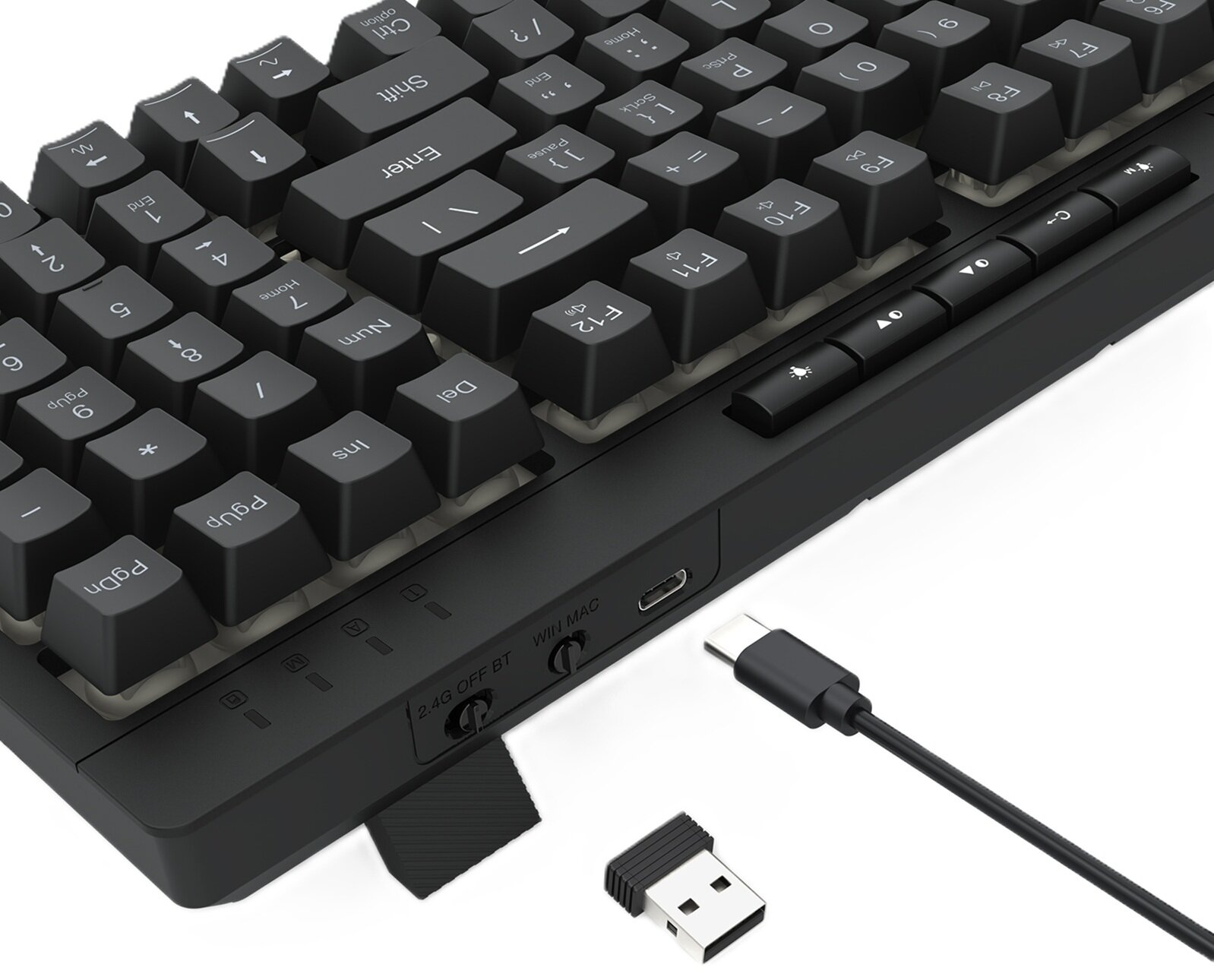 Czarna klawiatura mechaniczna z białymi oznaczeniami klawiszy. Podłączony kabel USB-C i odbiornik USB.