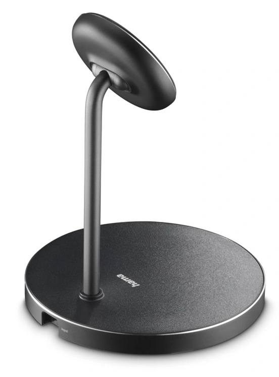 Czarny, nowoczesny stojak na słuchawki. Ma okrągłą podstawę, zakrzywiony trzon i górę, która trzyma słuchawki. Widoczna jest nazwa marki 'hama'.