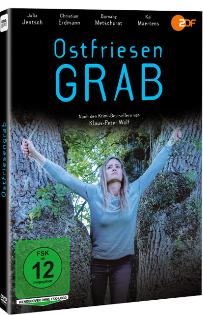 DVD-Cover: Frau zwischen Bäumen, Arme erhoben. Titel: Ostfriesen Grab. Schauspieler gelistet. FSK 12 Aufkleber. 2DF Logo.