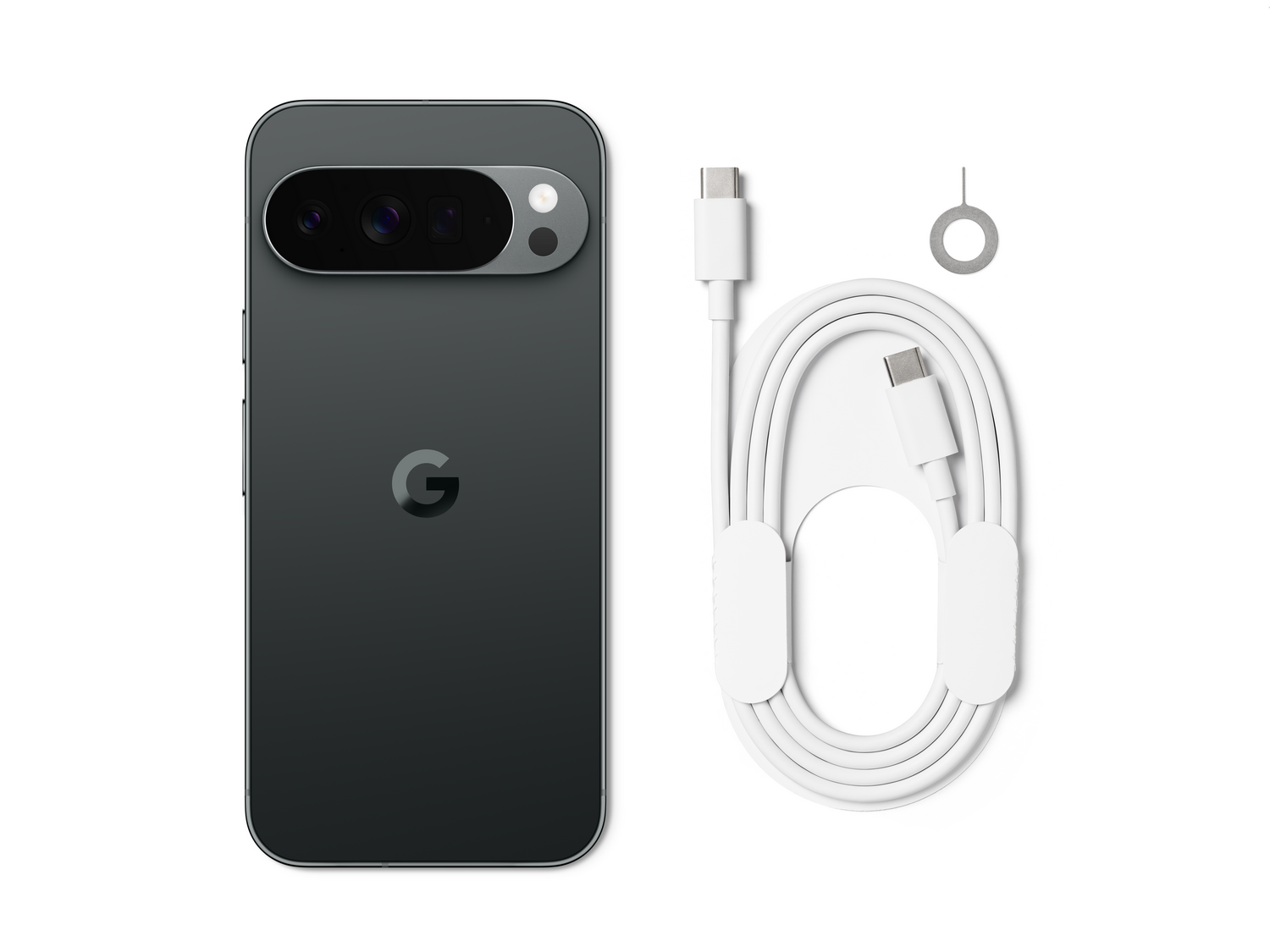 Un smartphone con un módulo de cámara, un cable blanco, una herramienta para la tarjeta SIM, todo sobre un fondo blanco. El teléfono es gris oscuro.