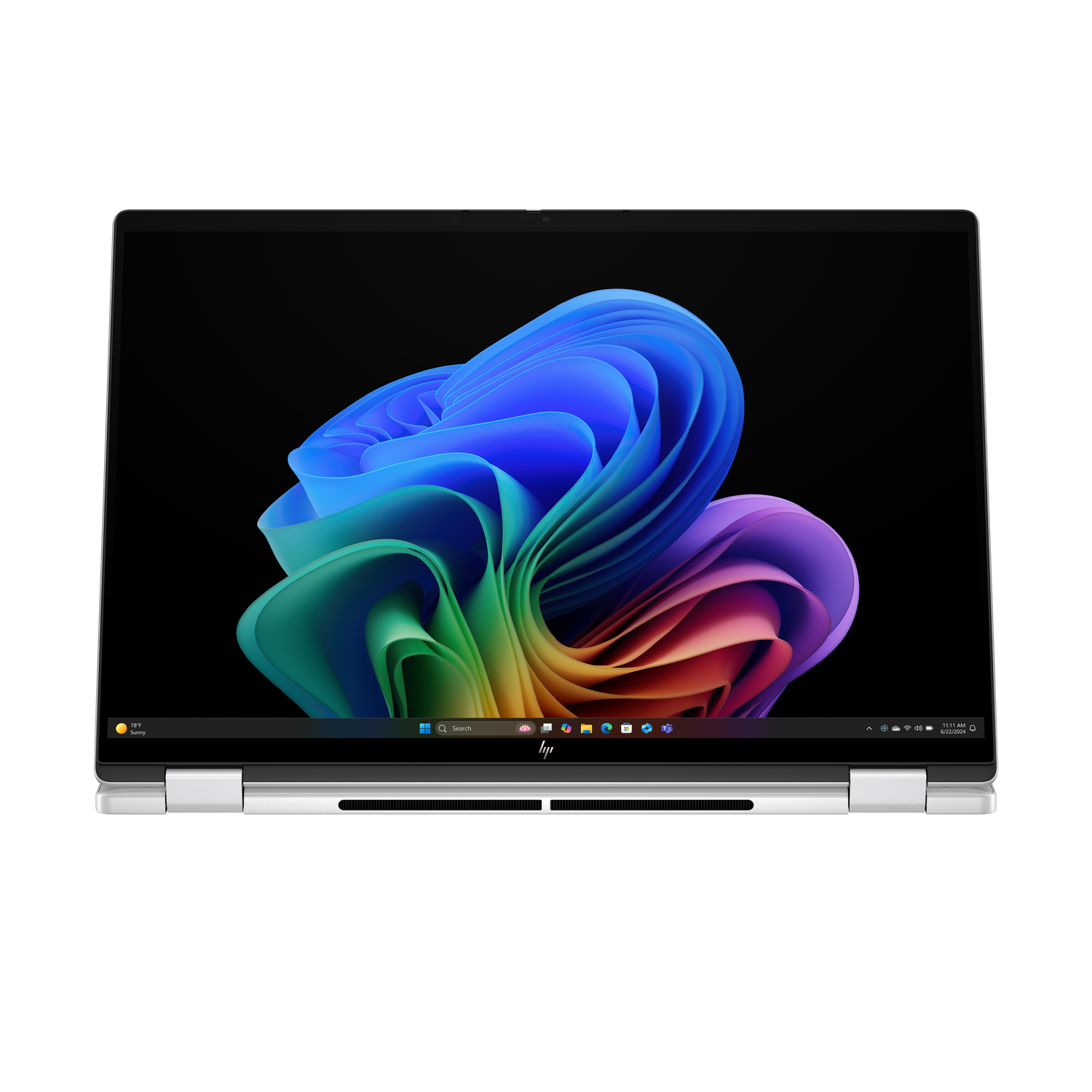 A silver HP laptop is open, displaying a colorful abstract image. The screen shows a Windows interface and the laptop is on a black background.