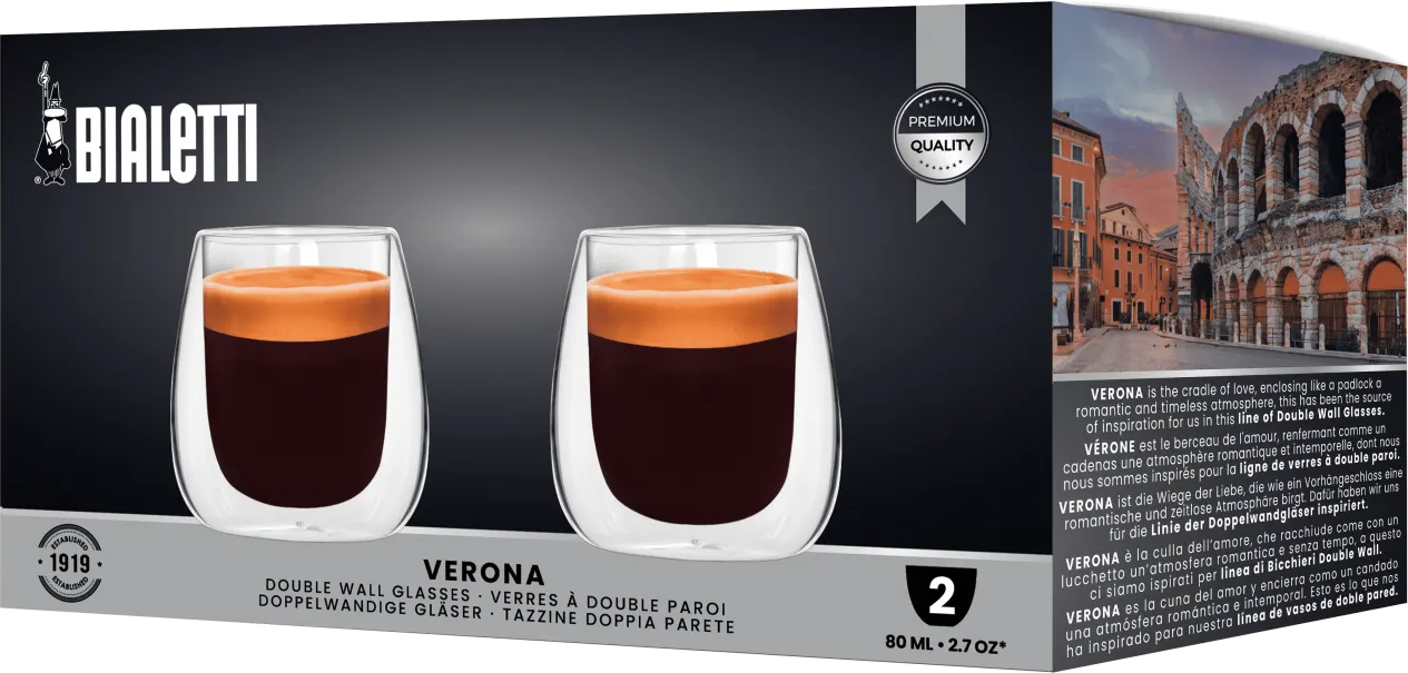 Két dupla falú pohár kávéval. A dobozon a Bialetti márka és Verona képe látható.