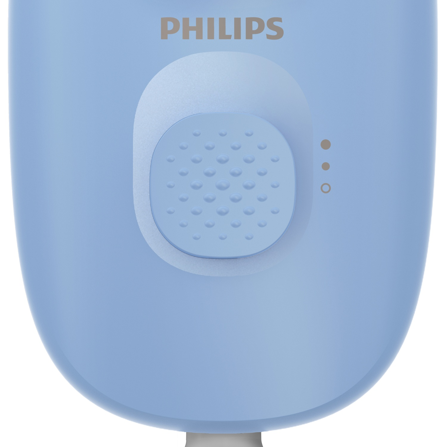Close-up of a light blue Philips device. It has a button with bumps and three small dots. The bottom is rounded.