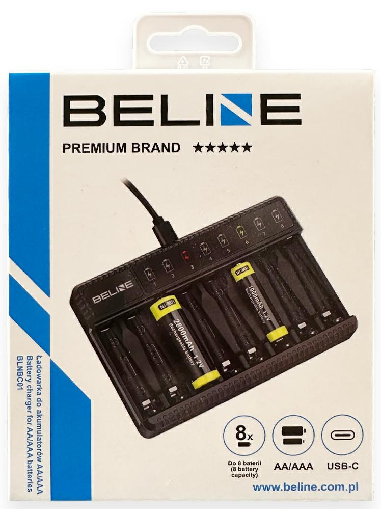 Pudełko ładowarki do akumulatorów Beline. Zawiera ładowarkę z bateriami. Tekst na pudełku to 'Premium Brand' i 'baterie AA/AAA'.