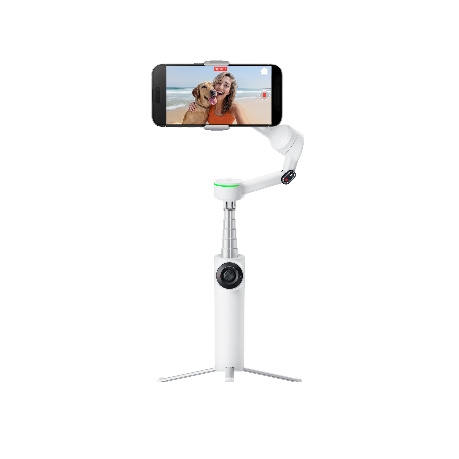 A white selfie stick holds a phone displaying a woman and dog on a beach, recording video. The background is white.