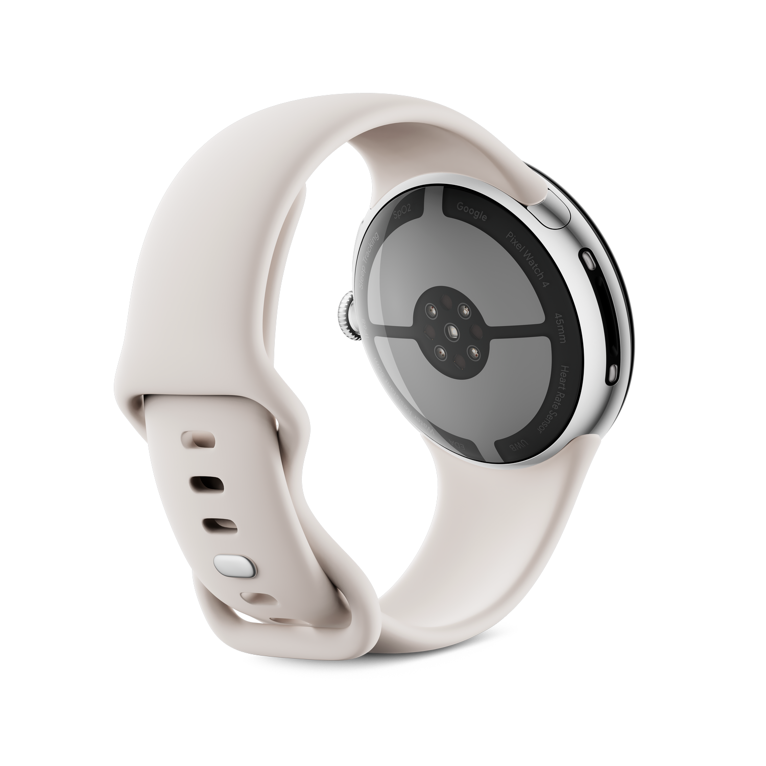 Un Google Pixel Watch 4, correa crema, caja plateada, sobre superficie gris. La parte inferior muestra sensores y etiquetas.