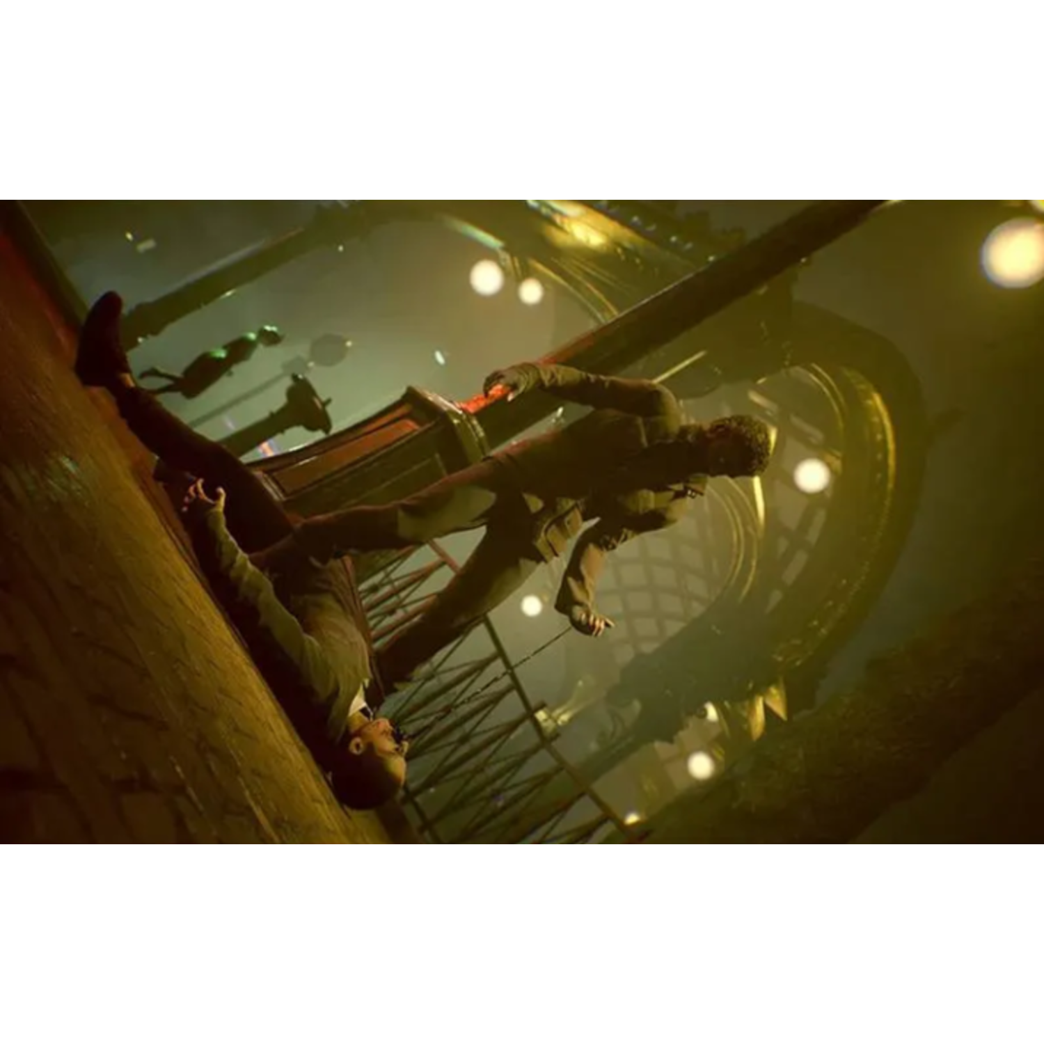 Two men in suits are in a dark, angled scene. One is falling, the other is reaching. The background has lights and architectural details.