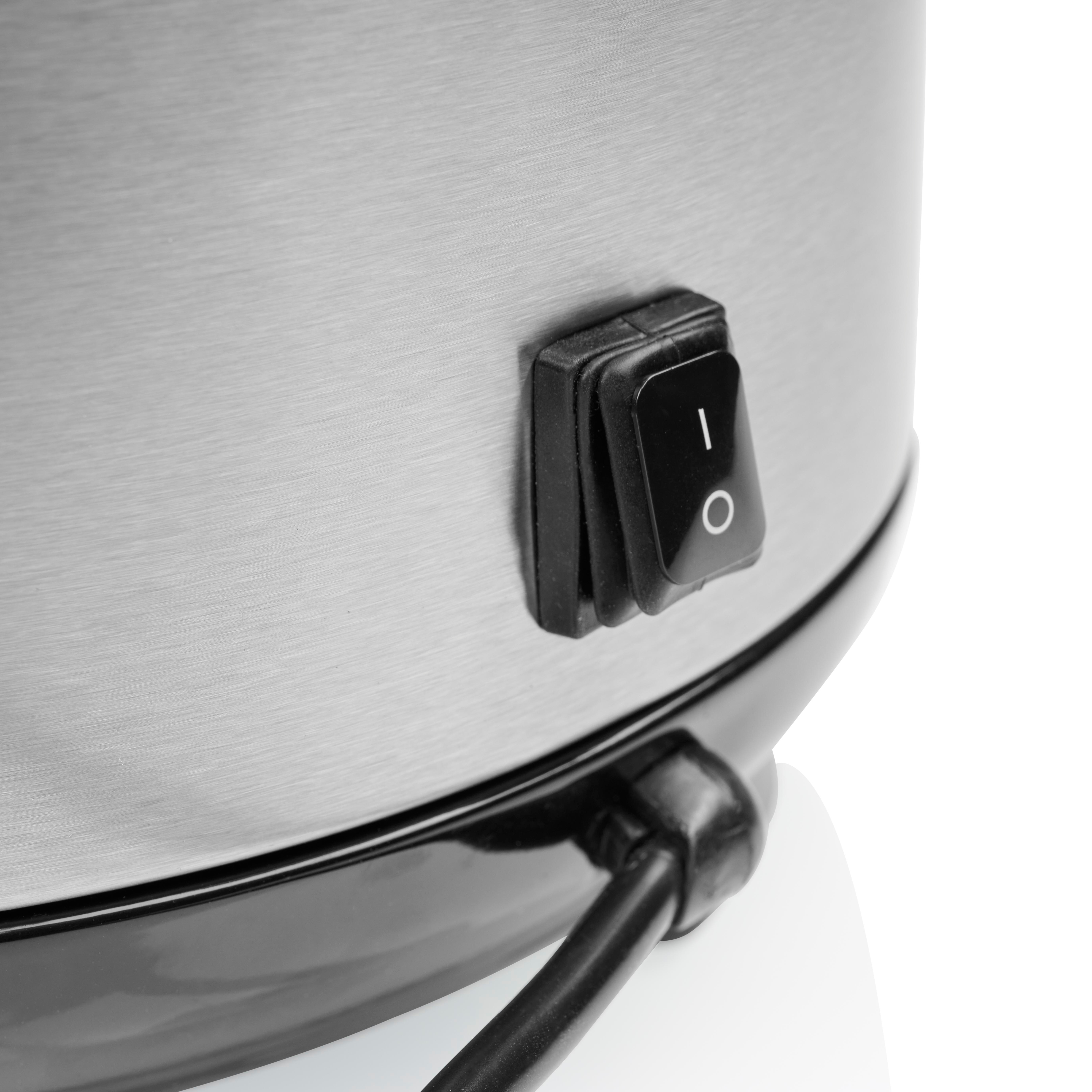Nahaufnahme eines Metallgeräts mit einem schwarzen Ein-/Ausschalter. Ein schwarzes Kabel ist eingesteckt.