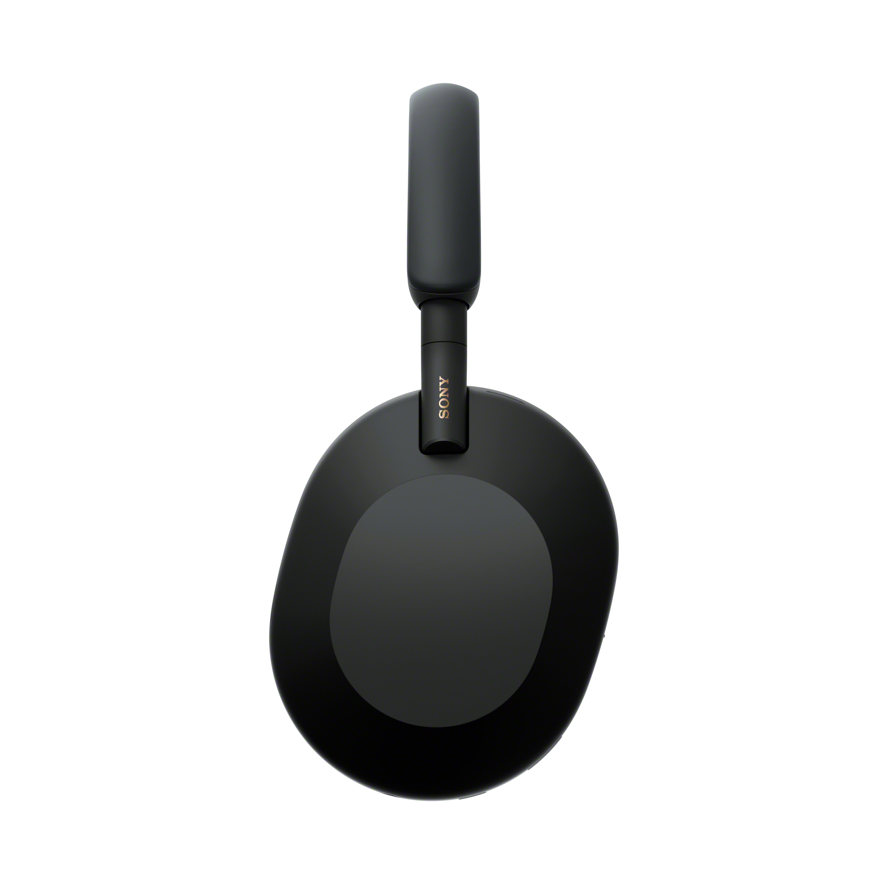 Fekete Sony fejhallgató felülnézetből. A fülpárnák nagyok, fejpánt köti össze őket. Fehér háttér.