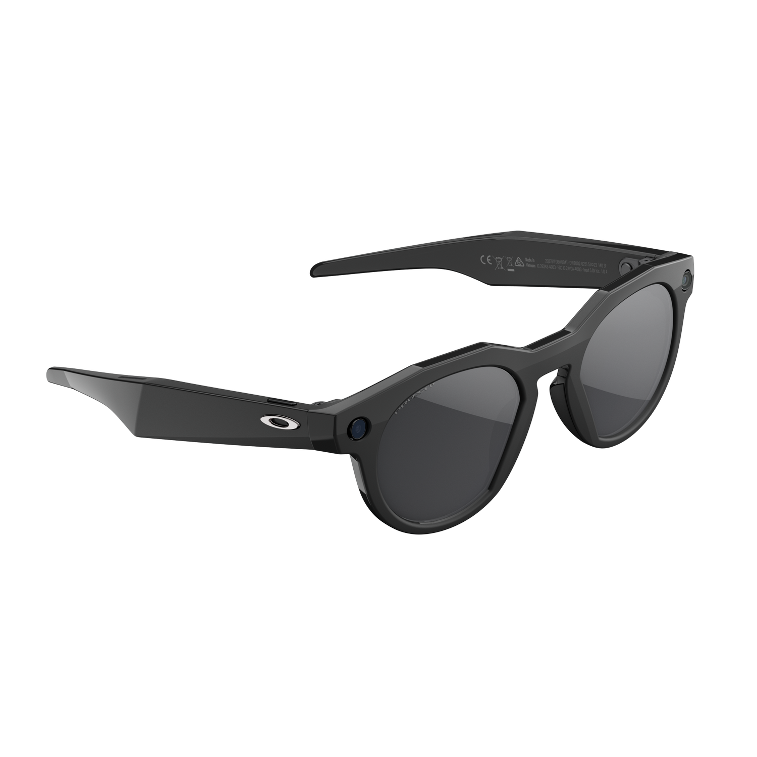Gafas de sol Oakley negras sobre un fondo gris. Las gafas tienen lentes oscuras y monturas gruesas. El logotipo de Oakley es visible.